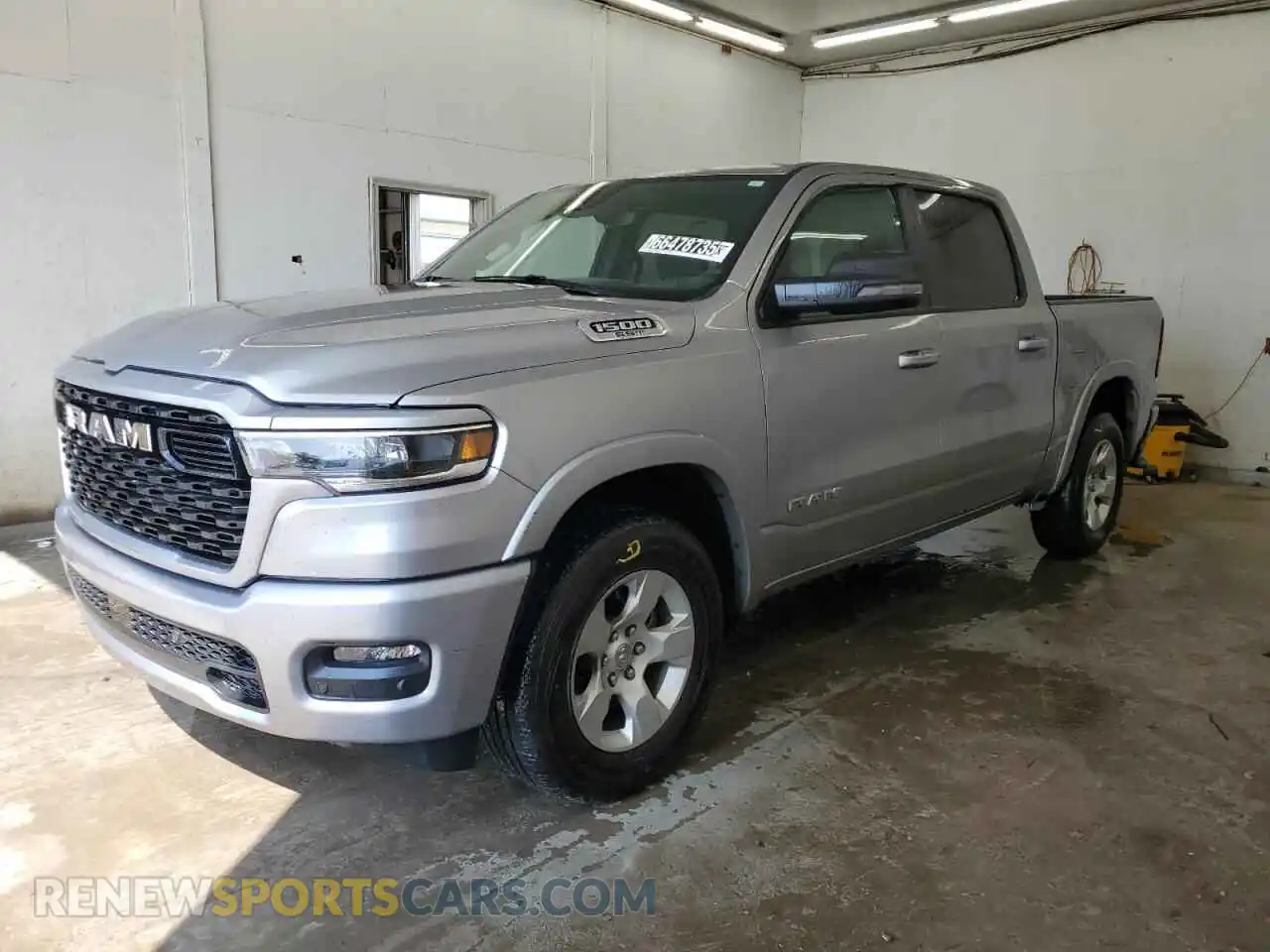 1 Photograph of a damaged car 1C6SRFFP8SN654571 RAM 1500 2025