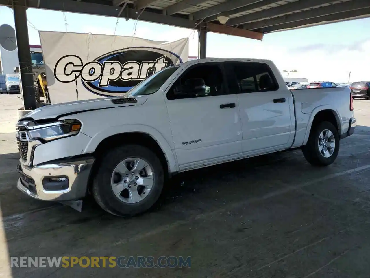 1 Photograph of a damaged car 1C6SRFFP9SN584367 RAM 1500 2025