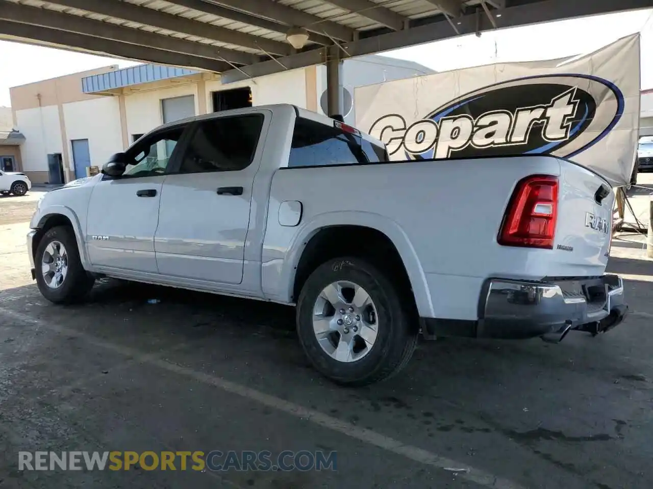2 Photograph of a damaged car 1C6SRFFP9SN584367 RAM 1500 2025