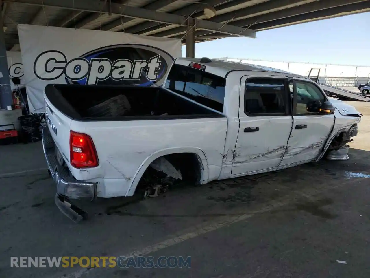 3 Photograph of a damaged car 1C6SRFFP9SN584367 RAM 1500 2025