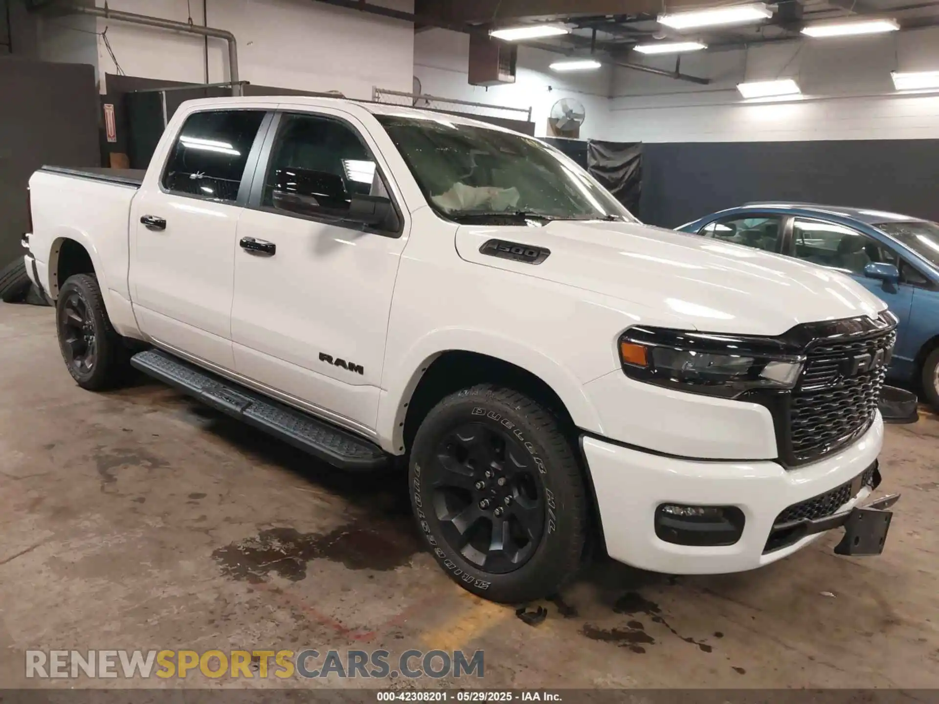 1 Photograph of a damaged car 1C6SRFFP9SN703082 RAM 1500 2025