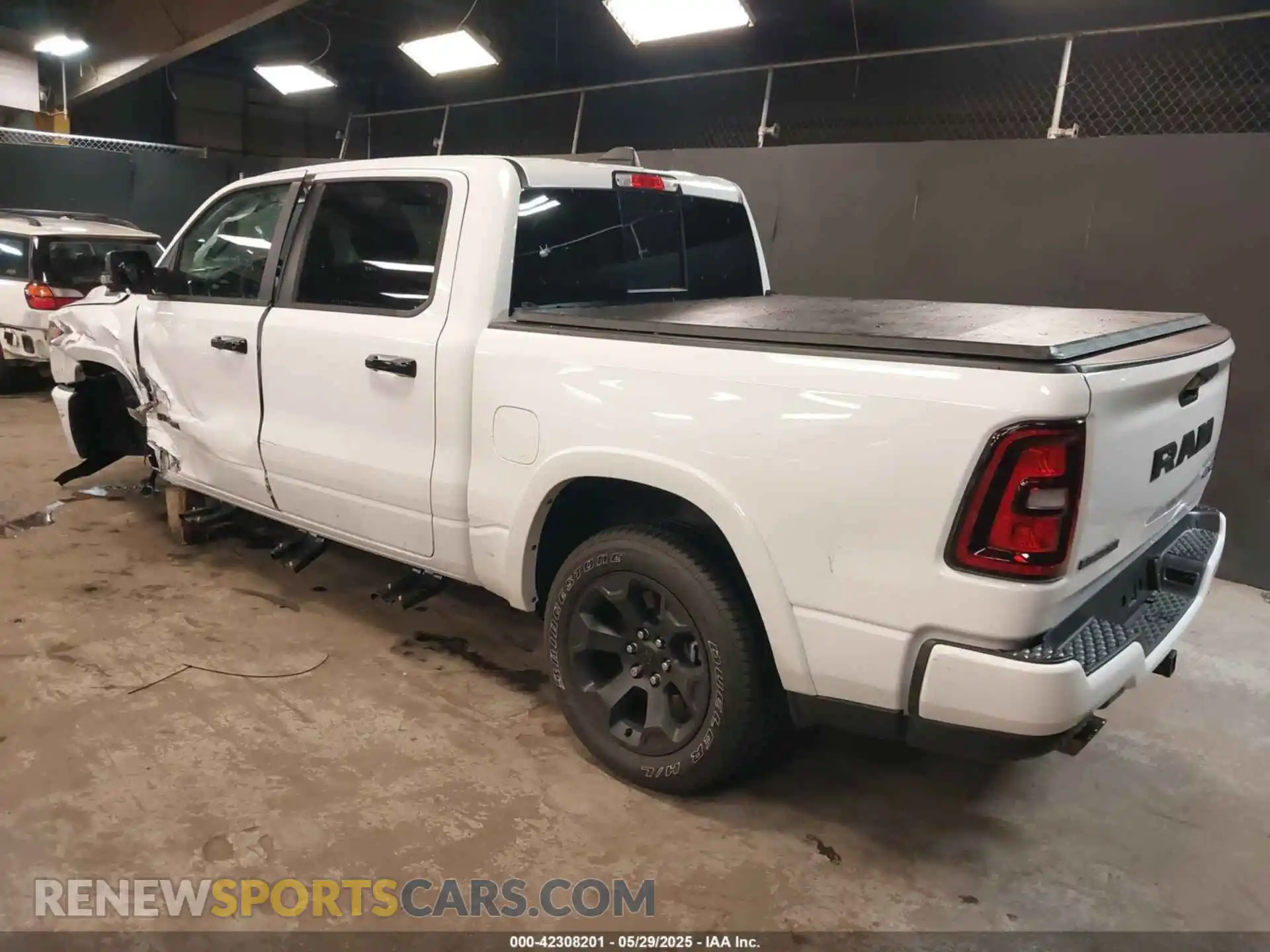 3 Photograph of a damaged car 1C6SRFFP9SN703082 RAM 1500 2025