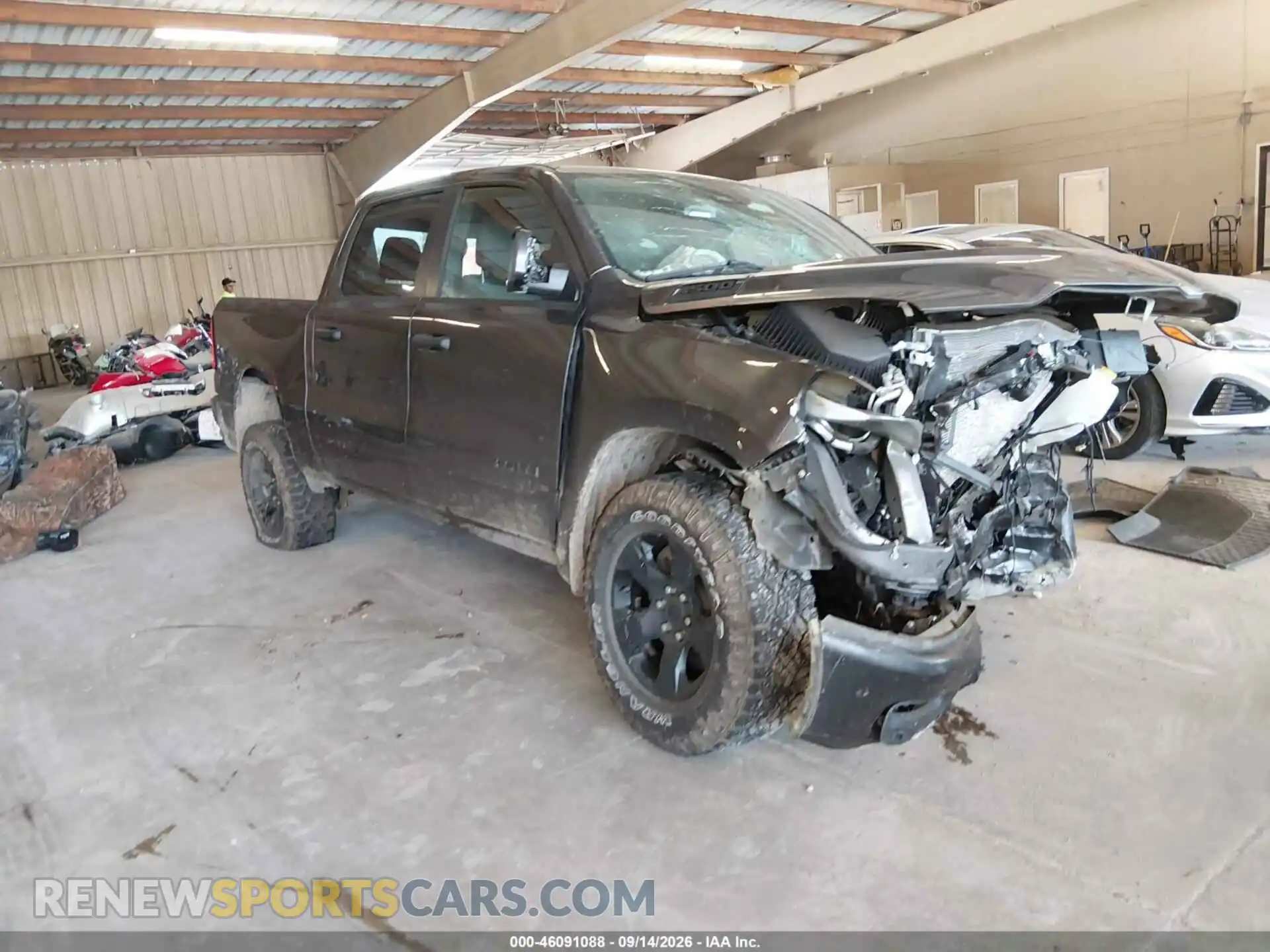 1 Photograph of a damaged car 1C6SRFGP0SN703583 RAM 1500 2025