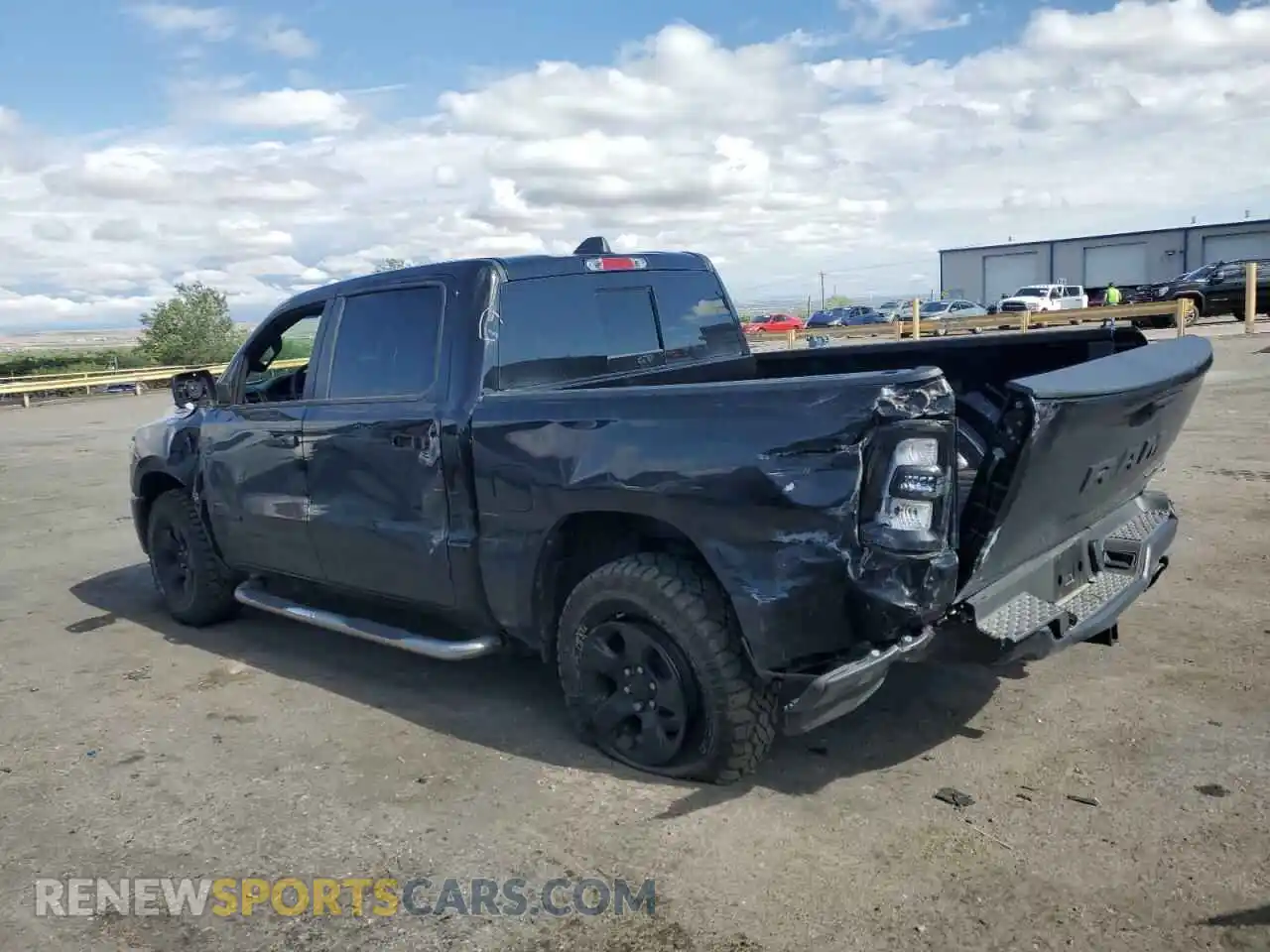 2 Photograph of a damaged car 1C6SRFGP7SN697913 RAM 1500 2025