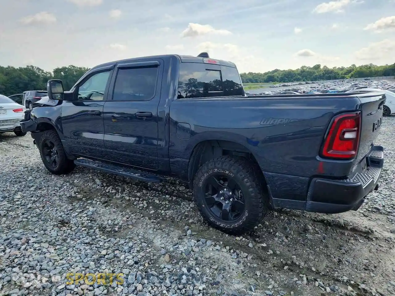 2 Photograph of a damaged car 1C6SRFGP8SN654200 RAM 1500 2025