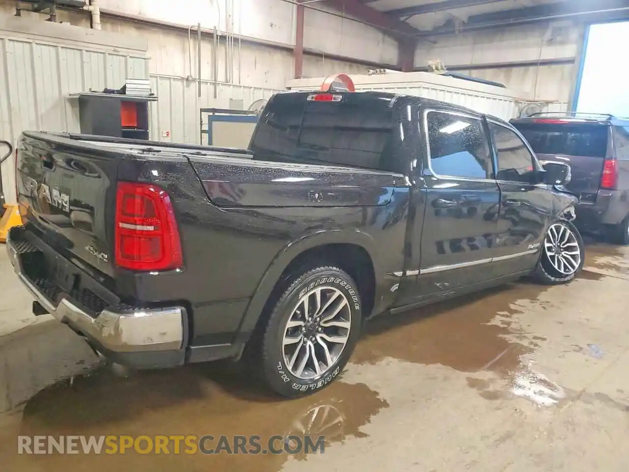 3 Photograph of a damaged car 1C6SRFHP3SN638842 RAM 1500 2025