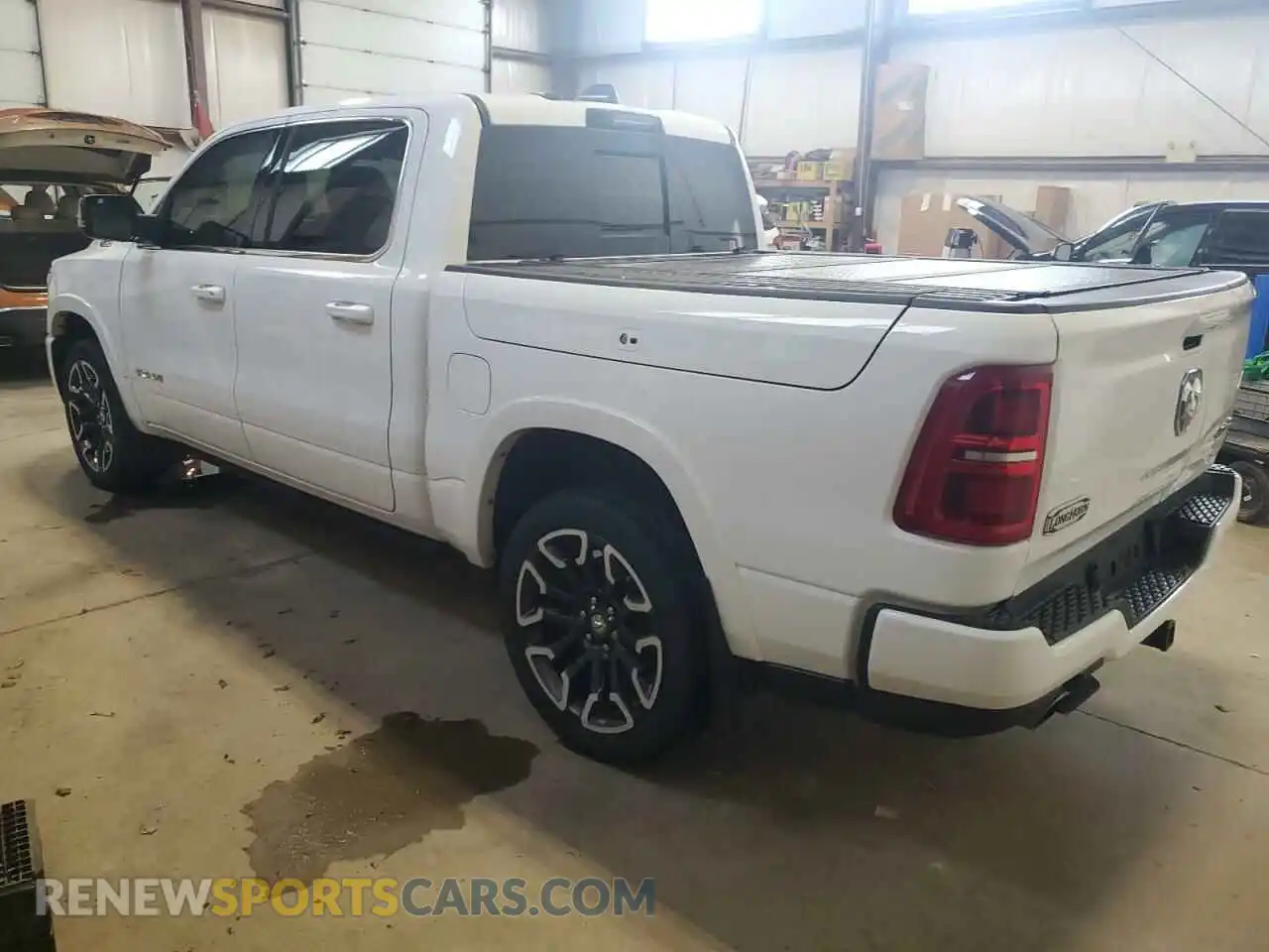 2 Photograph of a damaged car 1C6SRFHP8SN569078 RAM 1500 2025