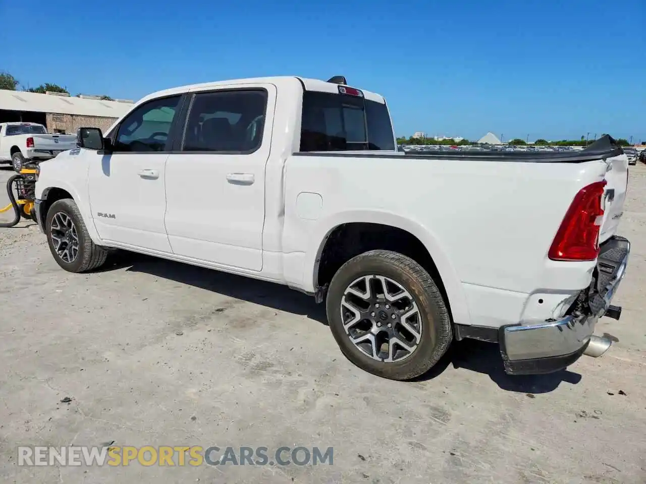 2 Photograph of a damaged car 1C6SRFJP3SN597140 RAM 1500 2025