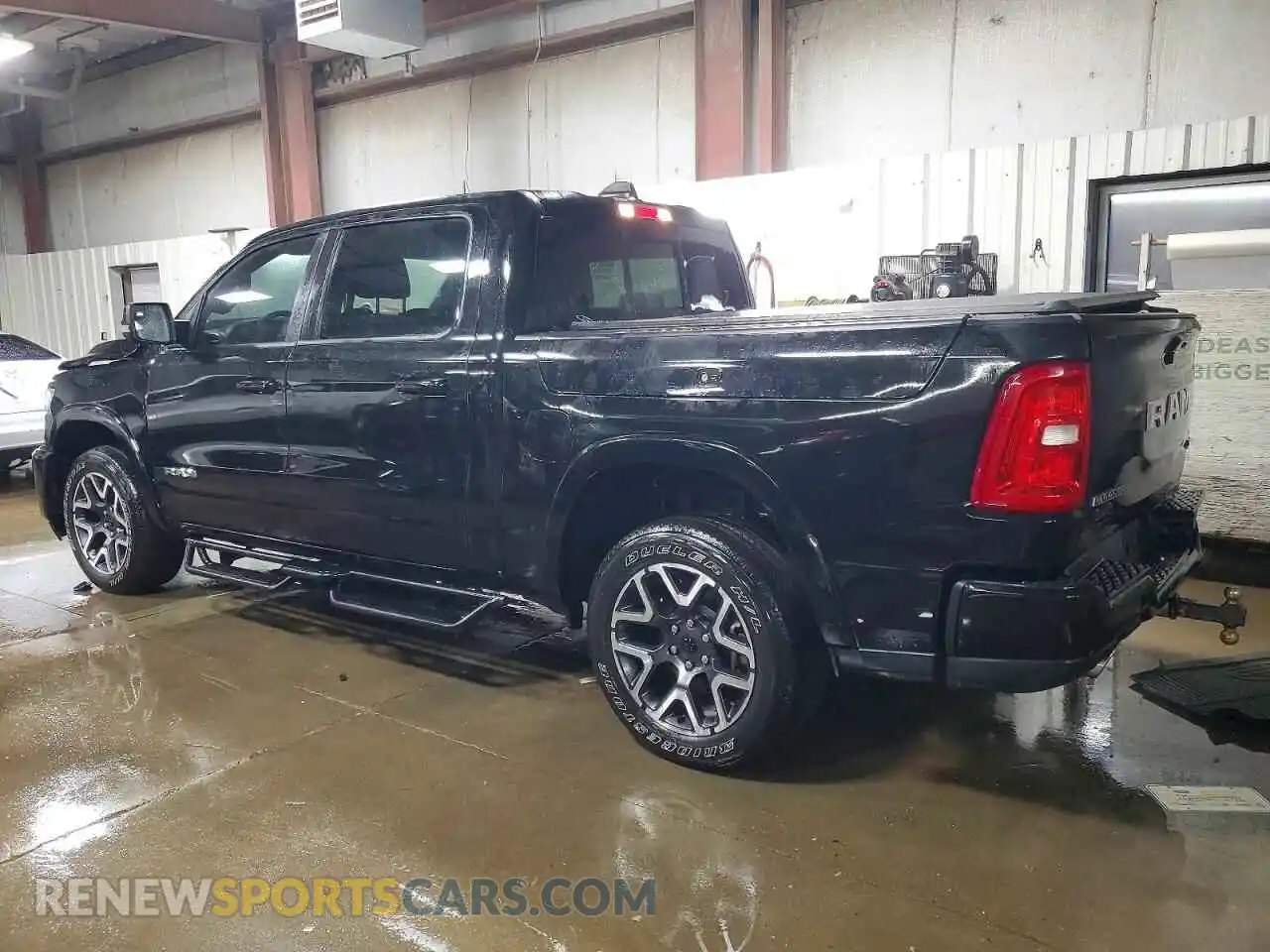 2 Photograph of a damaged car 1C6SRFJP6SN536882 RAM 1500 2025