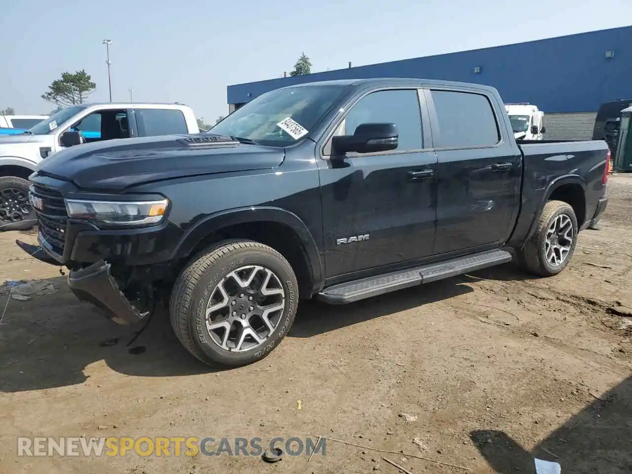 1 Photograph of a damaged car 1C6SRFJP9SN512057 RAM 1500 2025