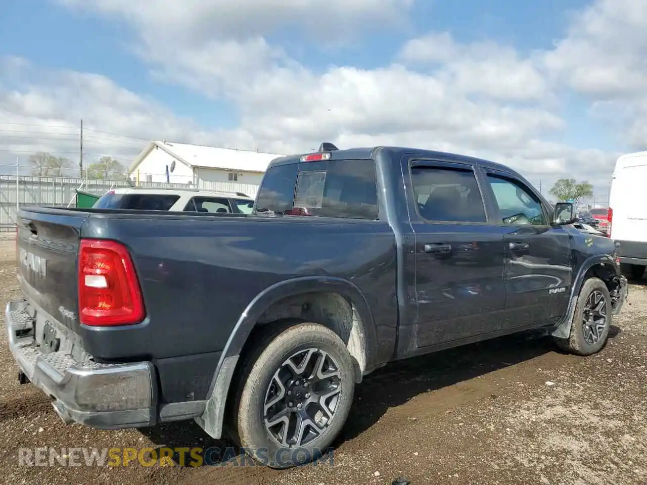 3 Photograph of a damaged car 1C6SRFJPXSN655602 RAM 1500 2025