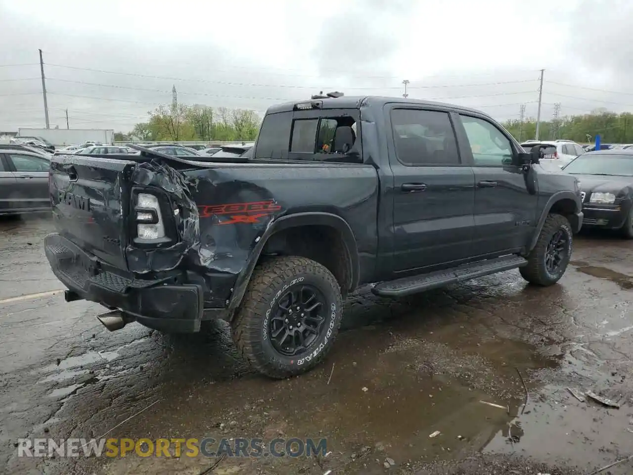 3 Photograph of a damaged car 1C6SRFLP0SN663172 RAM 1500 2025