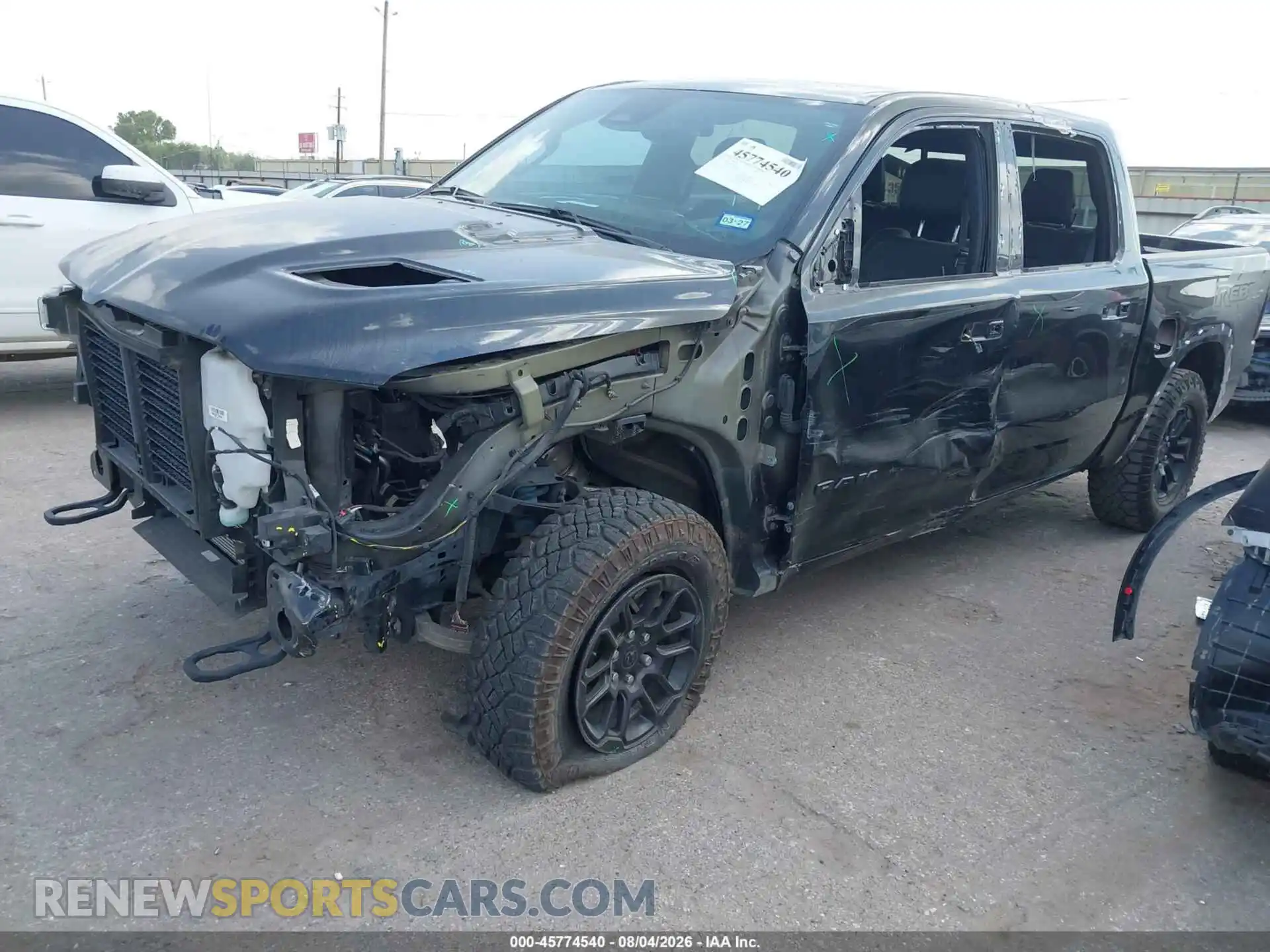 2 Photograph of a damaged car 1C6SRFLP0SN684152 RAM 1500 2025