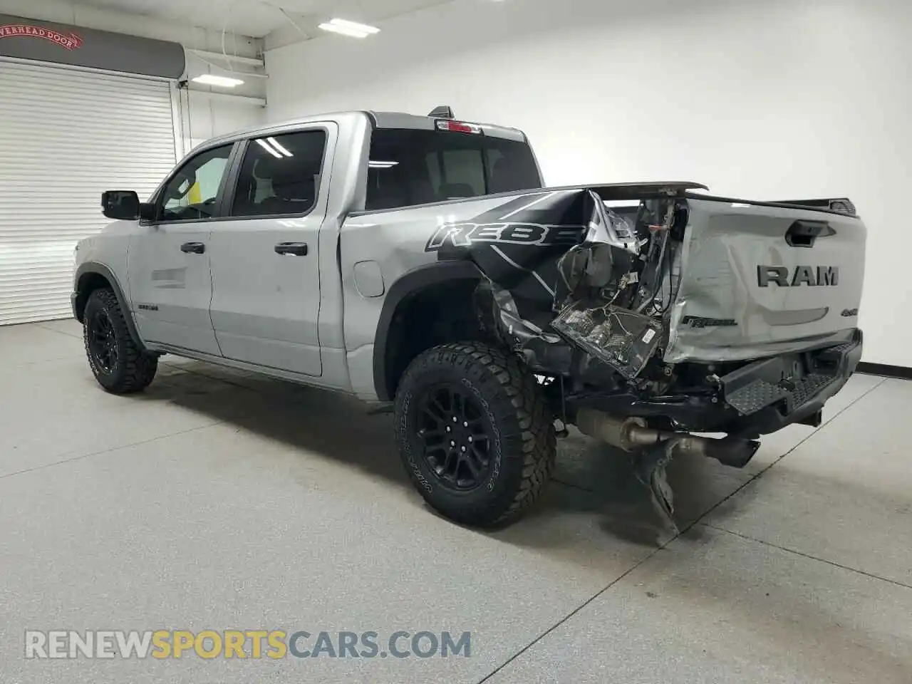 2 Photograph of a damaged car 1C6SRFLP1SN583881 RAM 1500 2025