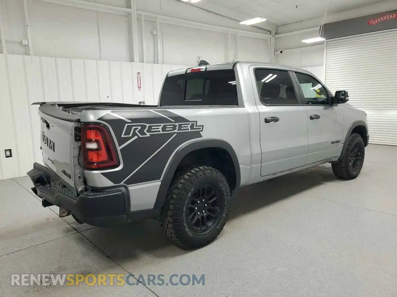 3 Photograph of a damaged car 1C6SRFLP1SN583881 RAM 1500 2025