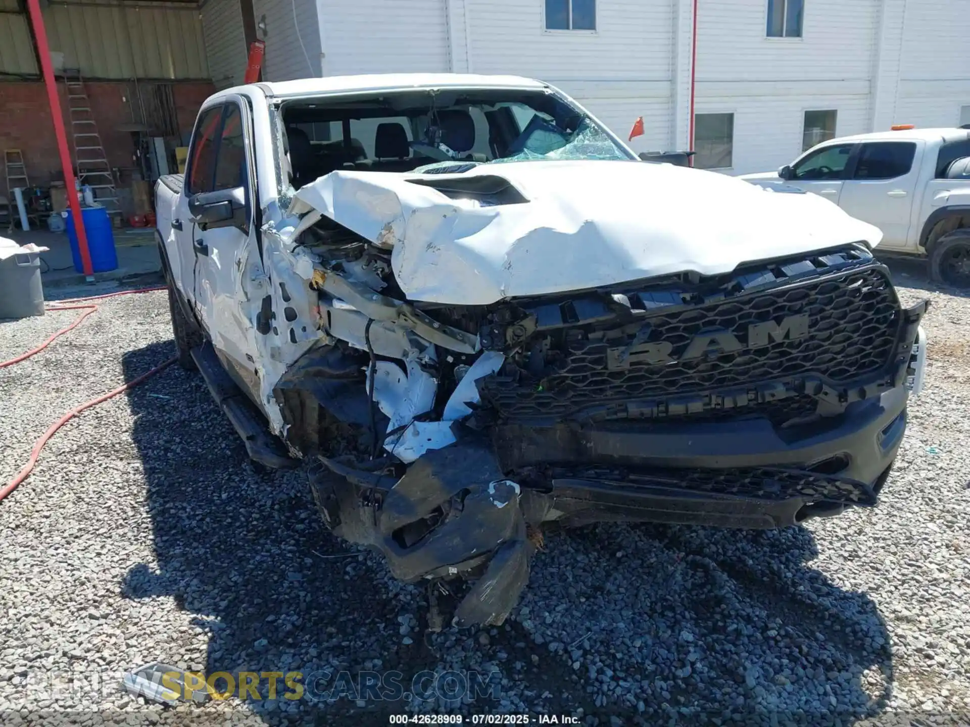 1 Photograph of a damaged car 1C6SRFLP3SN519230 RAM 1500 2025