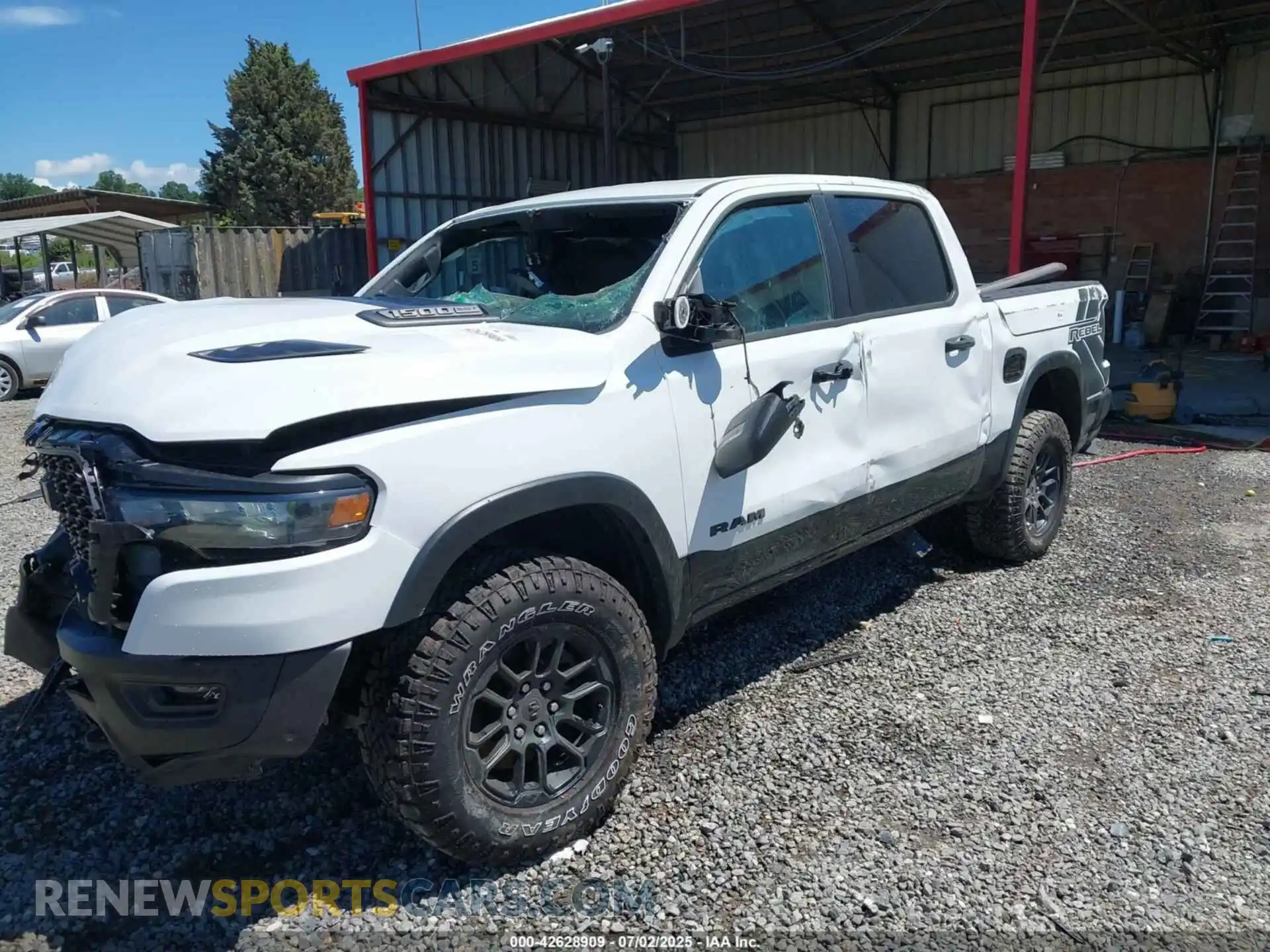 2 Photograph of a damaged car 1C6SRFLP3SN519230 RAM 1500 2025