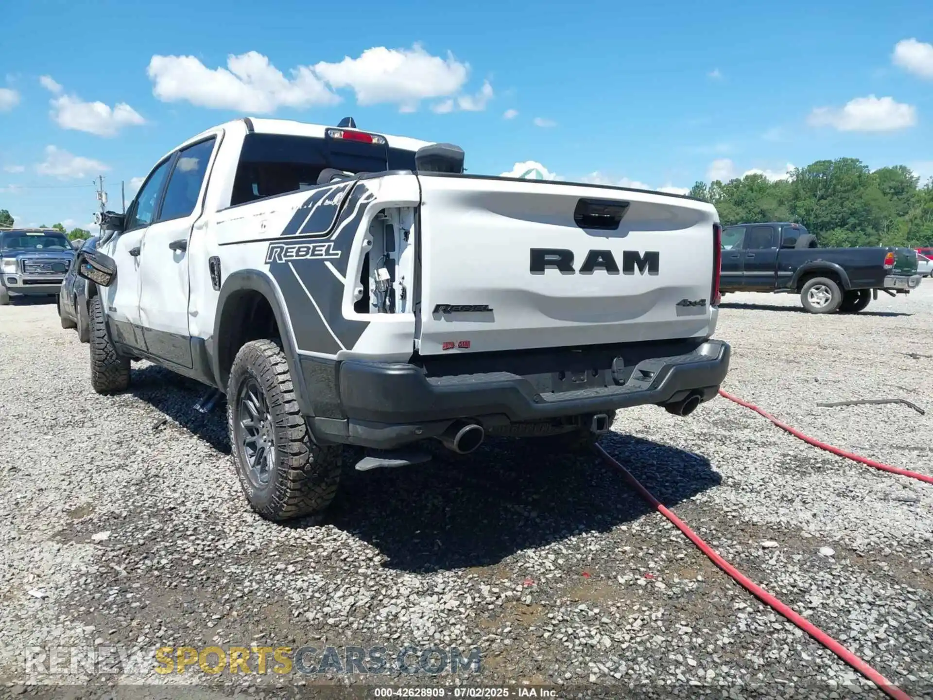 3 Photograph of a damaged car 1C6SRFLP3SN519230 RAM 1500 2025