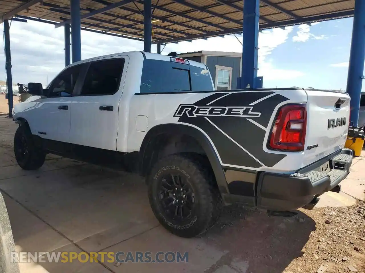 2 Photograph of a damaged car 1C6SRFLP3SN540627 RAM 1500 2025
