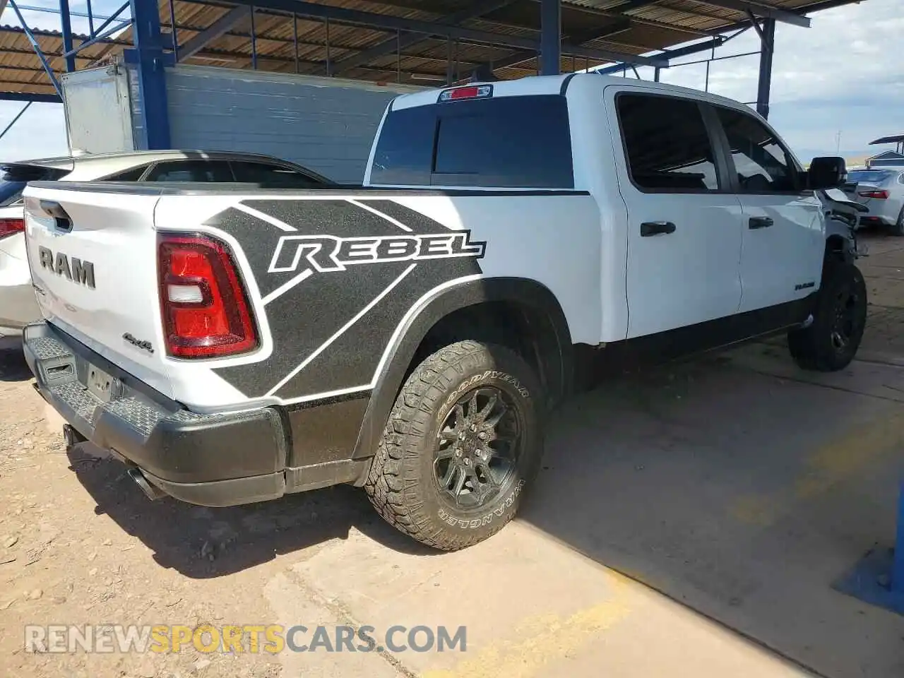 3 Photograph of a damaged car 1C6SRFLP3SN540627 RAM 1500 2025