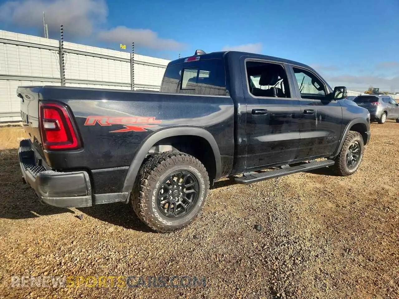 3 Photograph of a damaged car 1C6SRFLP4SN742683 RAM 1500 2025