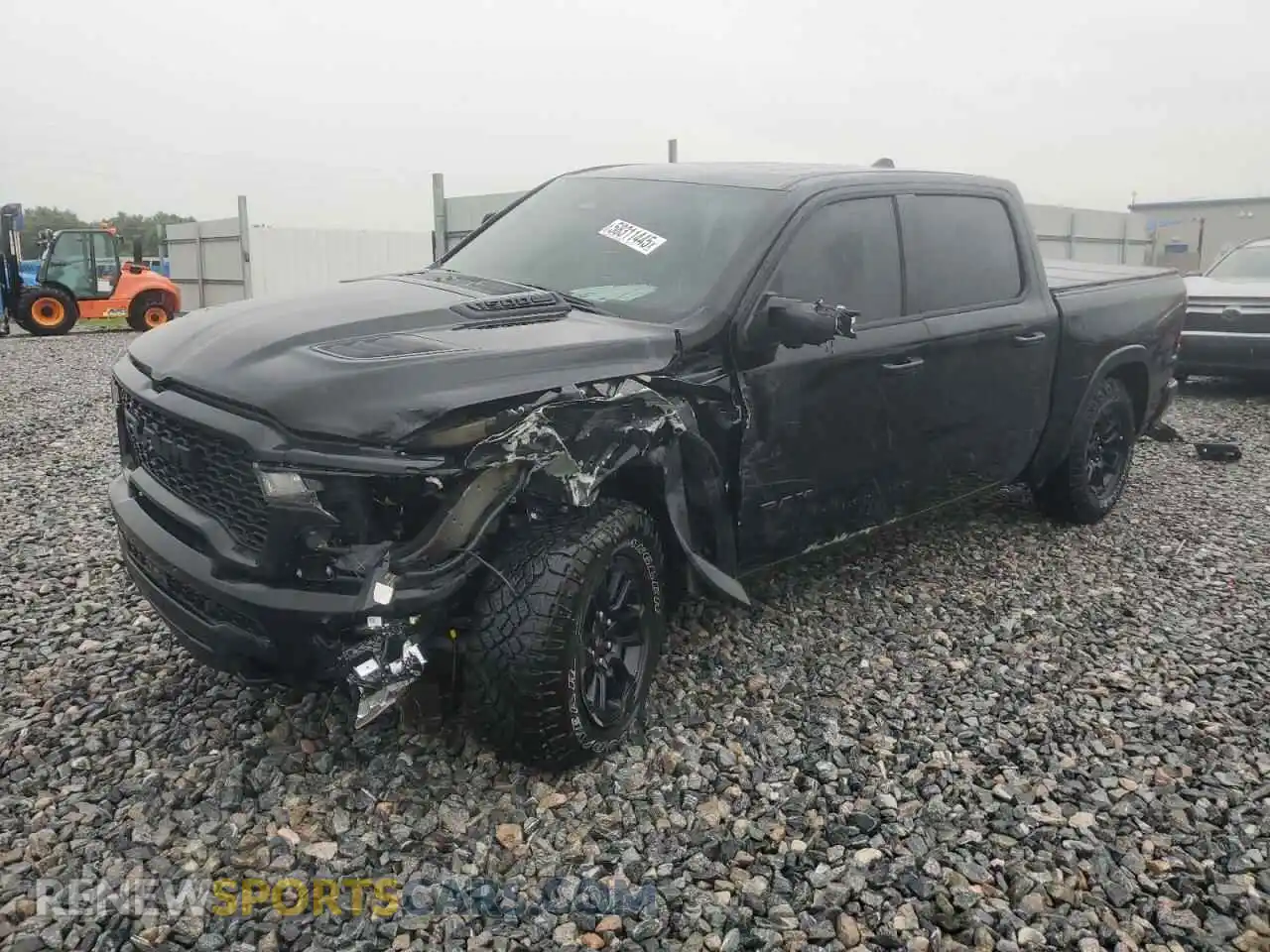 1 Photograph of a damaged car 1C6SRFLP5SN593961 RAM 1500 2025