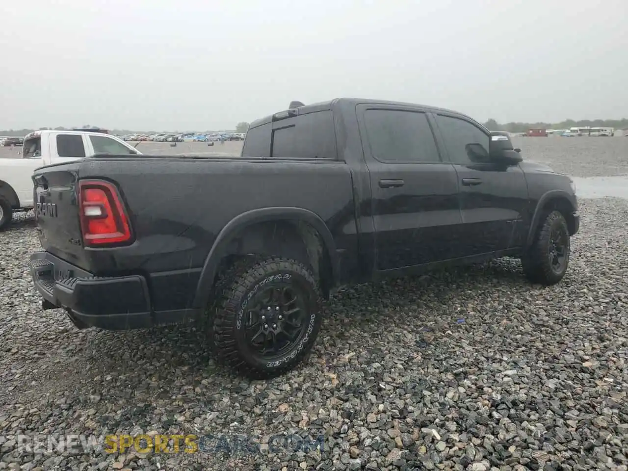 3 Photograph of a damaged car 1C6SRFLP5SN593961 RAM 1500 2025