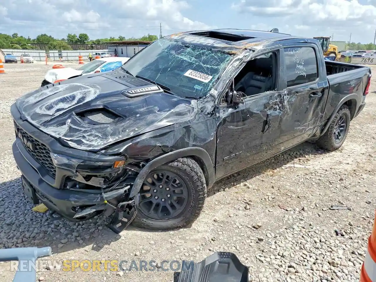1 Photograph of a damaged car 1C6SRFLP5SN695244 RAM 1500 2025