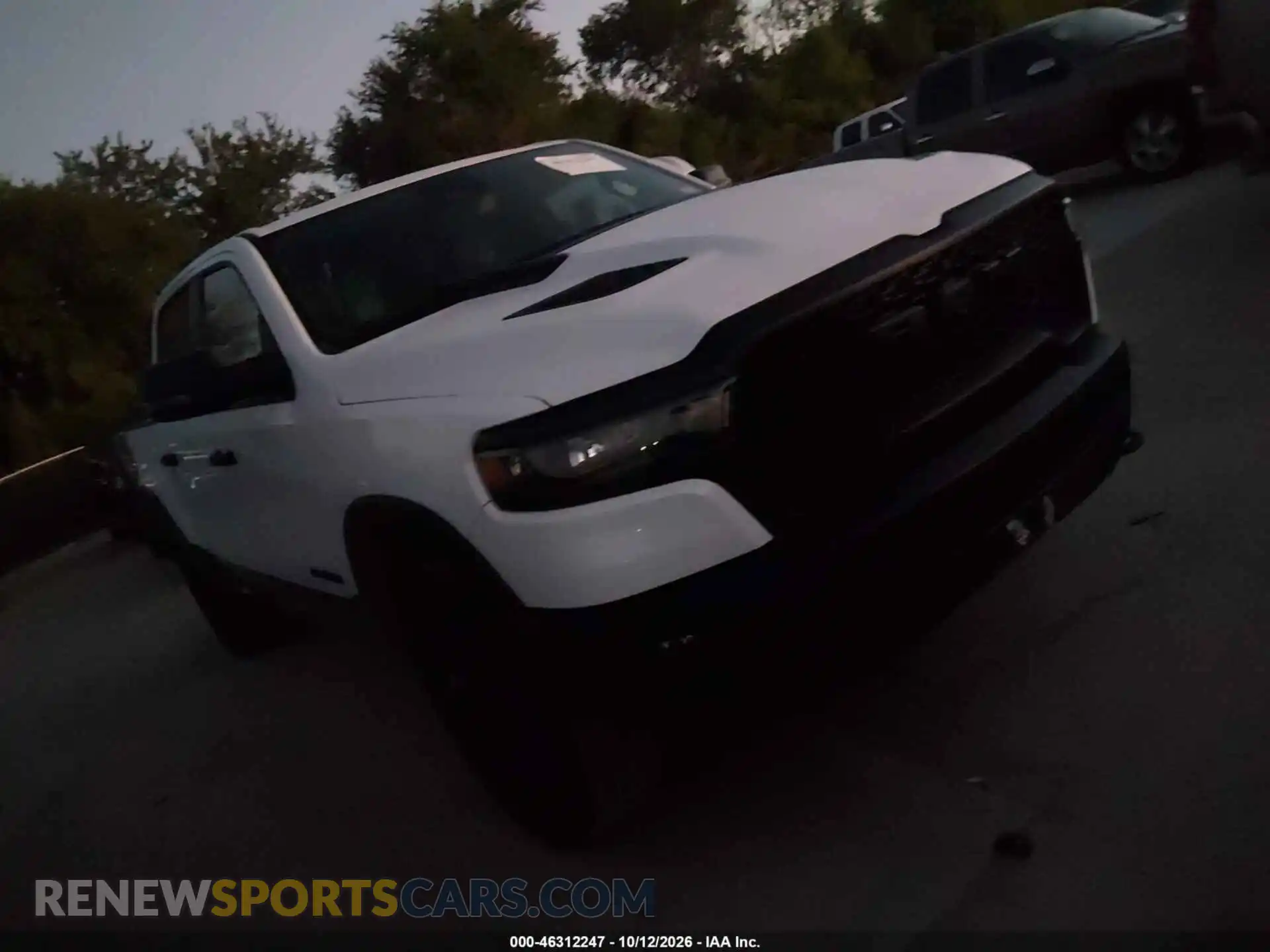 1 Photograph of a damaged car 1C6SRFLP6SN570401 RAM 1500 2025