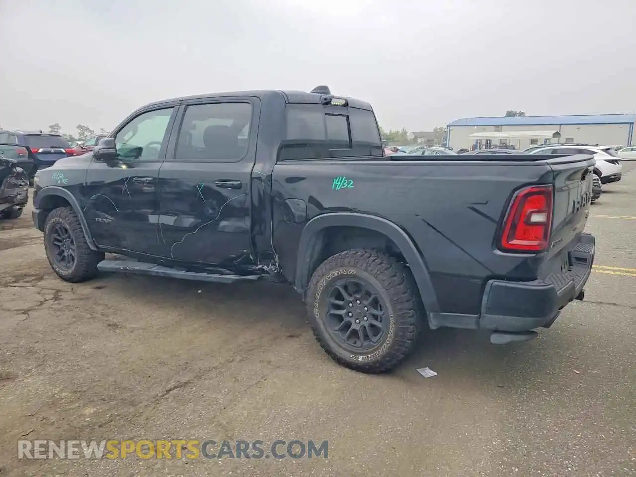 2 Photograph of a damaged car 1C6SRFLP8SN685873 RAM 1500 2025