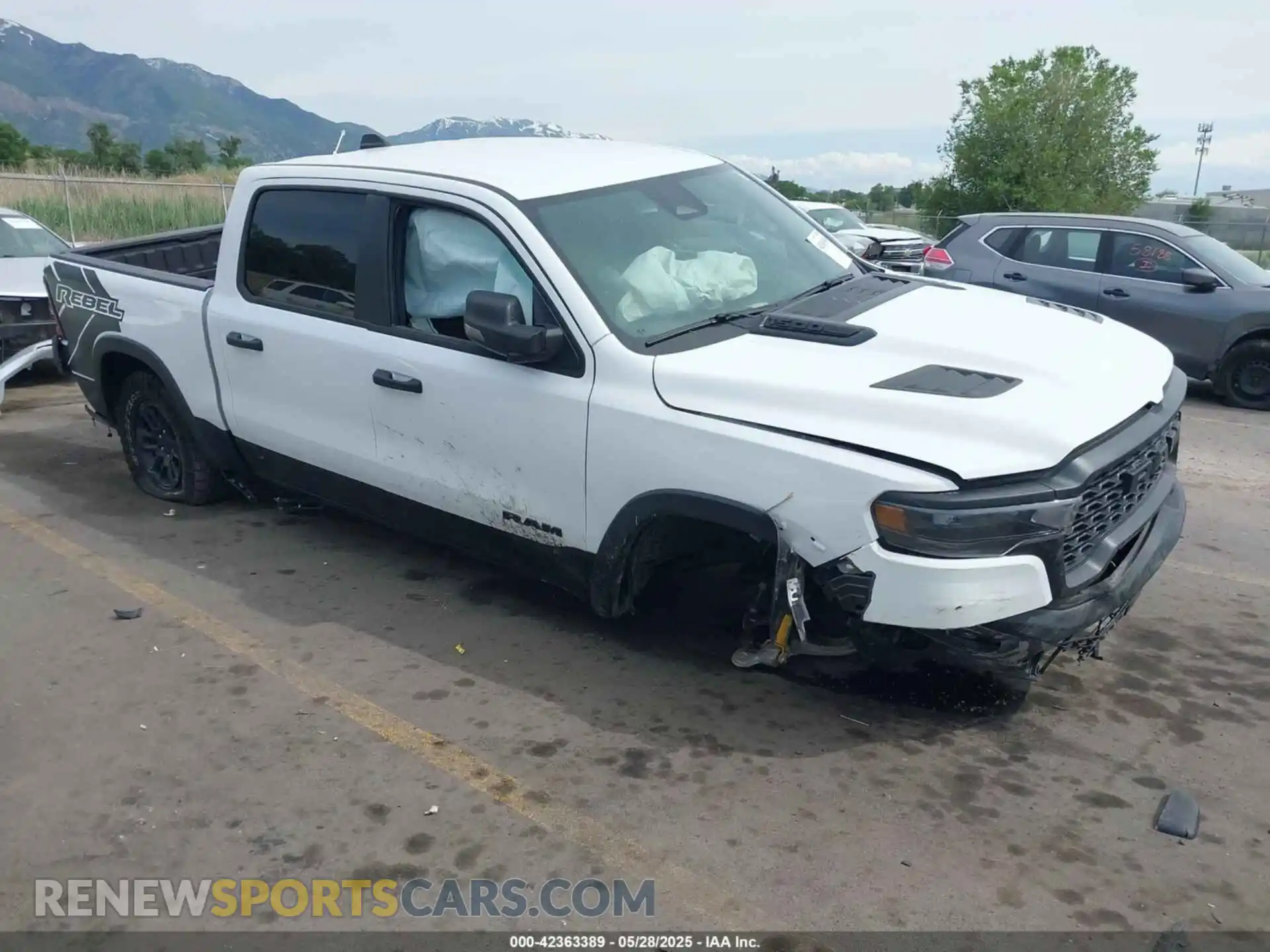 1 Photograph of a damaged car 1C6SRFLP9SN525209 RAM 1500 2025