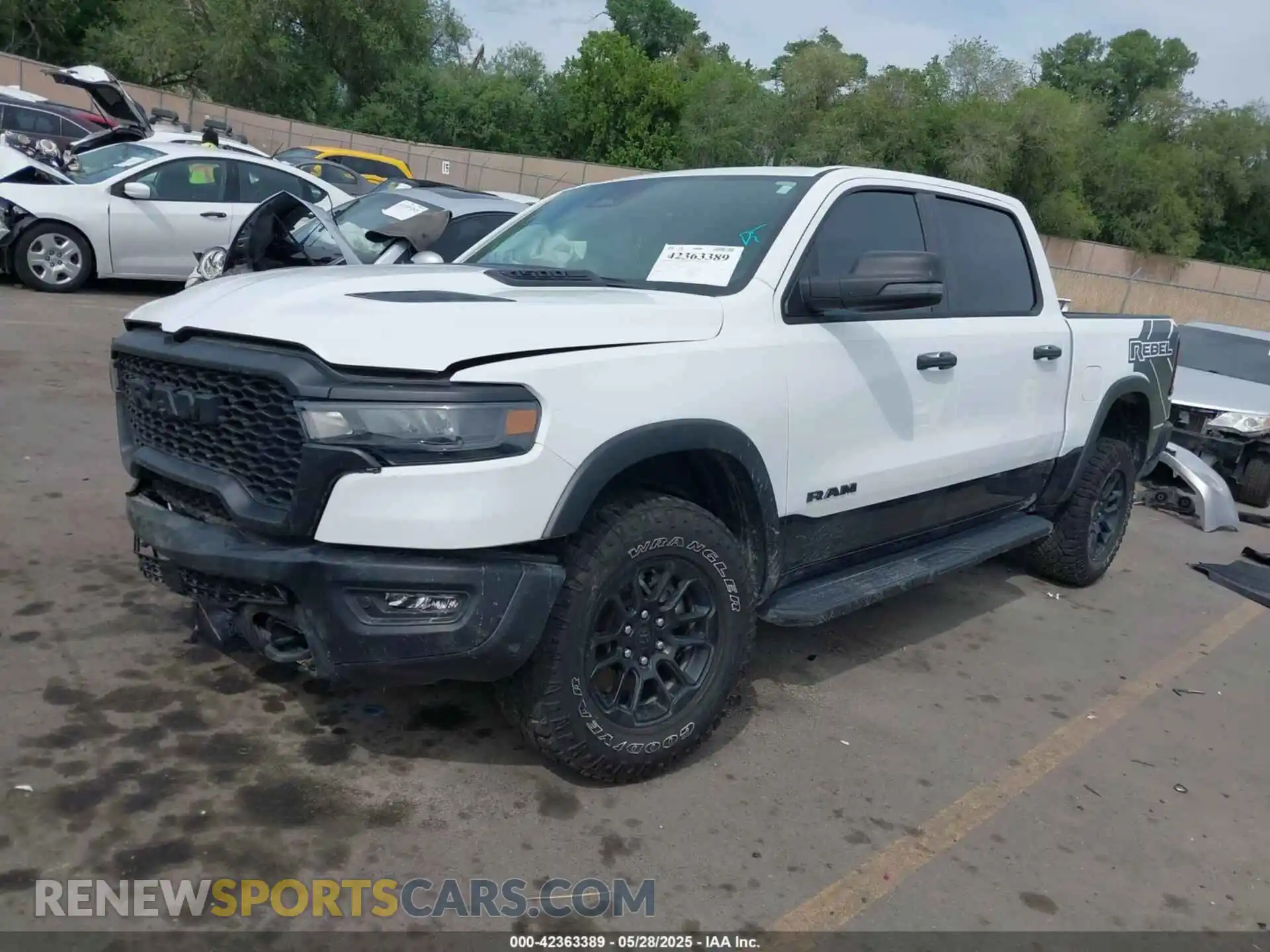 2 Photograph of a damaged car 1C6SRFLP9SN525209 RAM 1500 2025