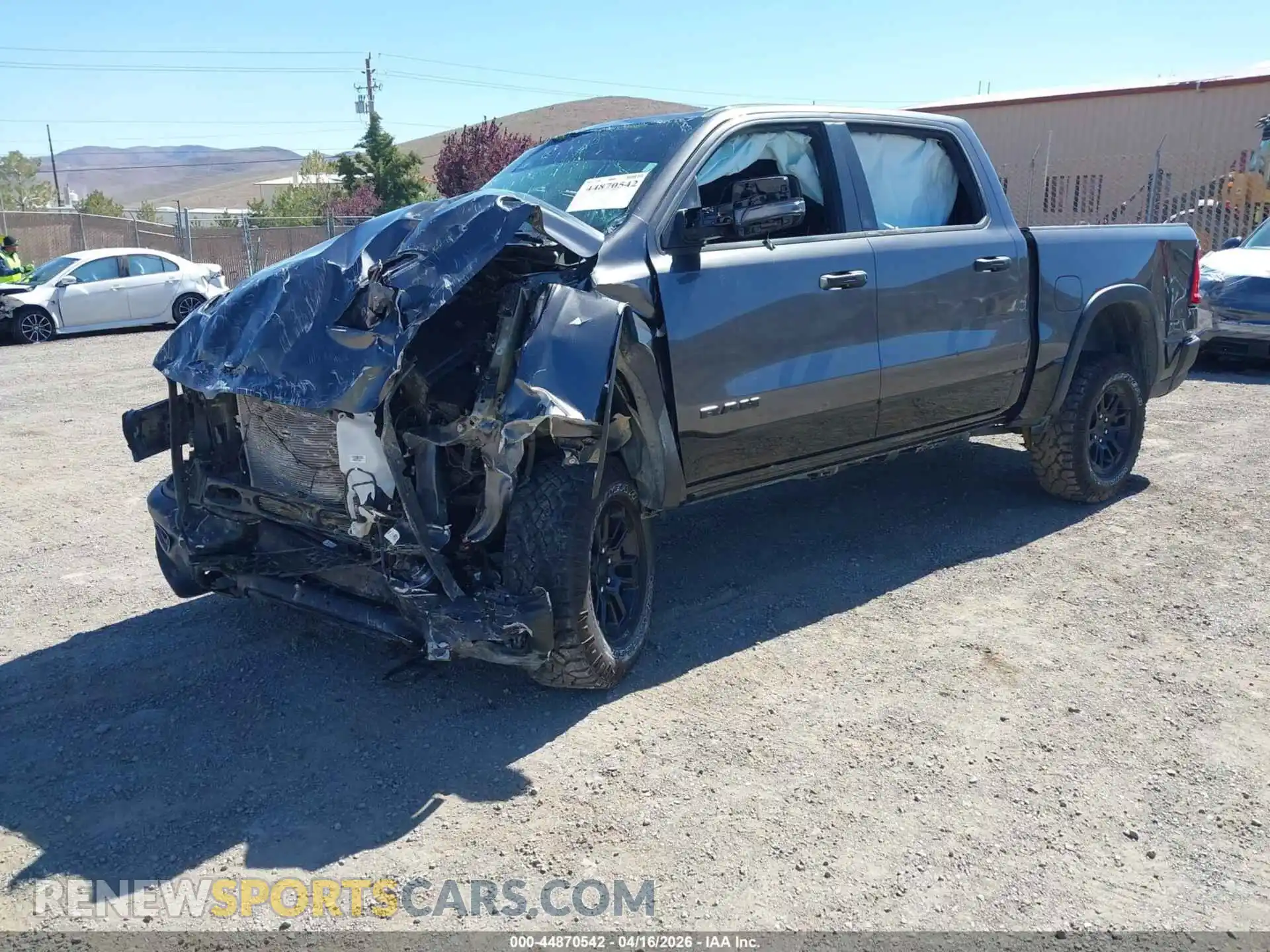 2 Photograph of a damaged car 1C6SRFLP9SN710862 RAM 1500 2025
