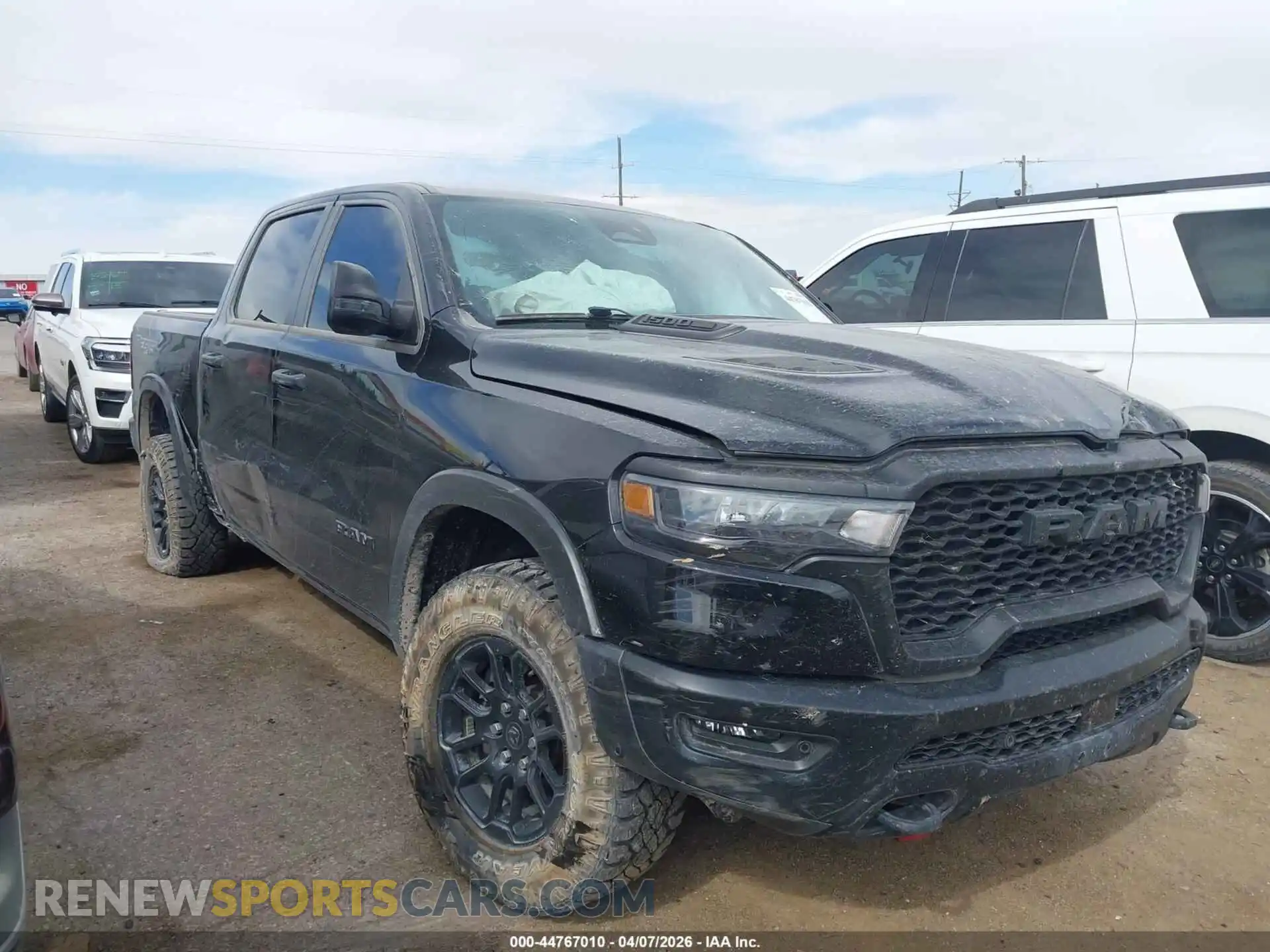1 Photograph of a damaged car 1C6SRFLPXSN535960 RAM 1500 2025