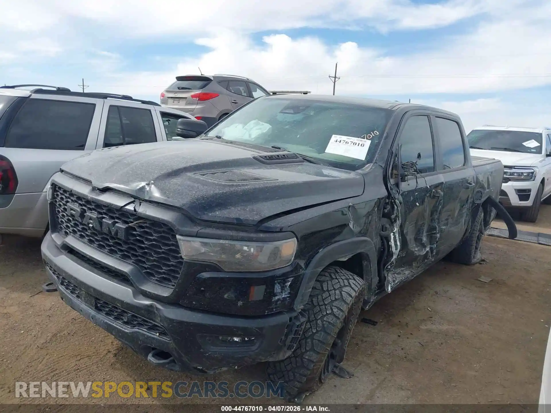 2 Photograph of a damaged car 1C6SRFLPXSN535960 RAM 1500 2025
