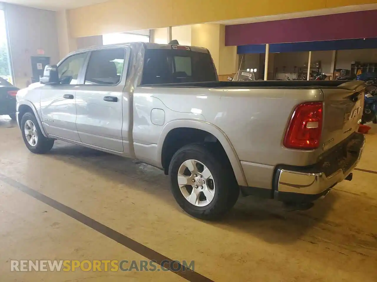 2 Photograph of a damaged car 1C6SRFMP0SN670489 RAM 1500 2025