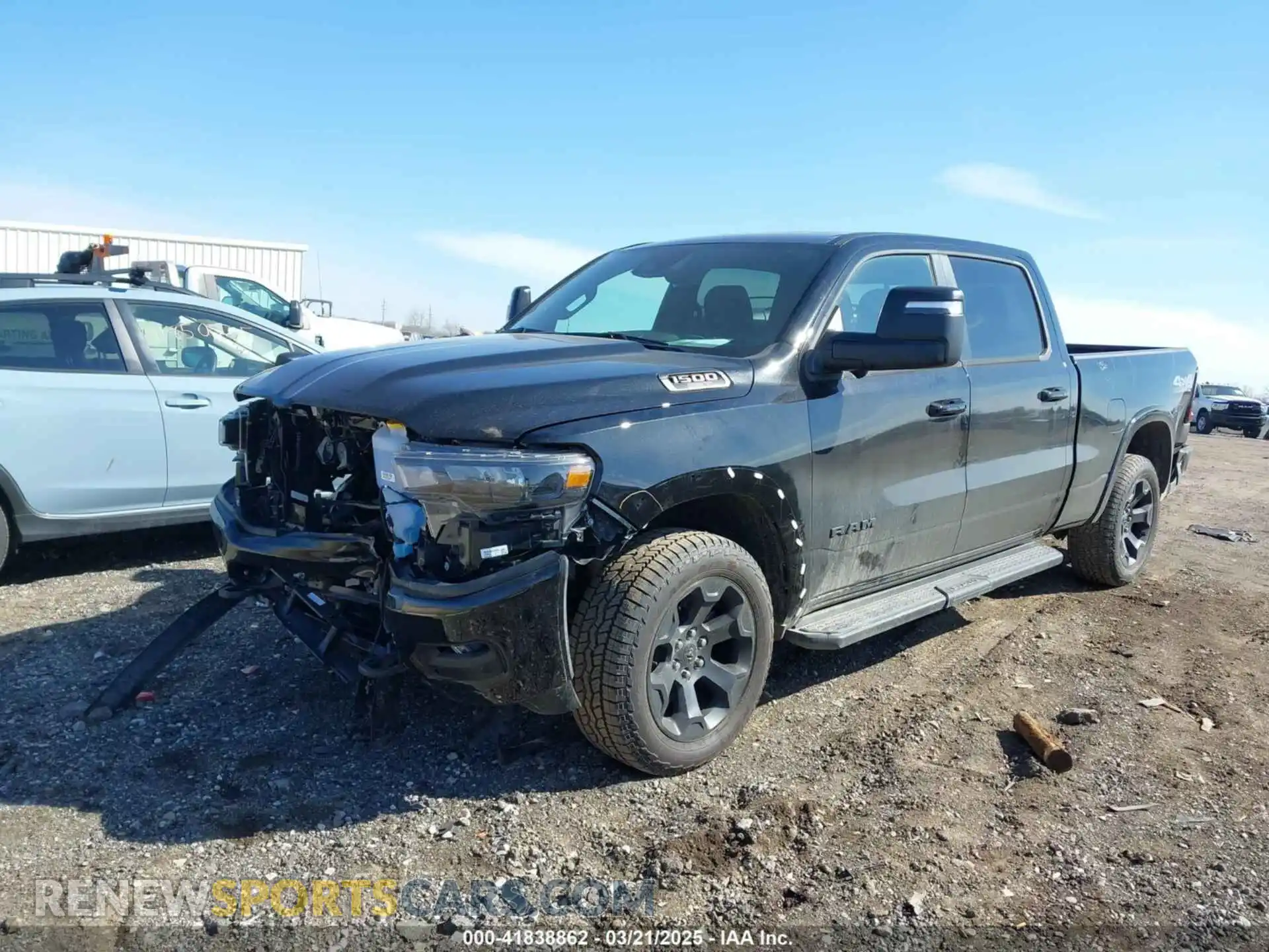 2 Photograph of a damaged car 1C6SRFMP2SN658960 RAM 1500 2025