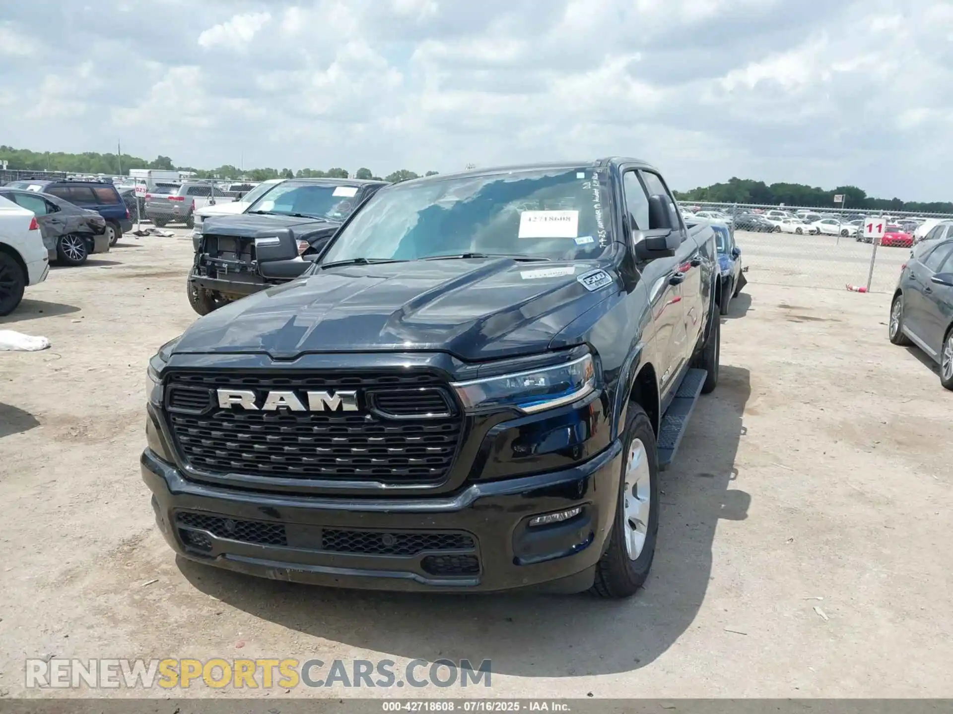 2 Photograph of a damaged car 1C6SRFMPXSN657247 RAM 1500 2025