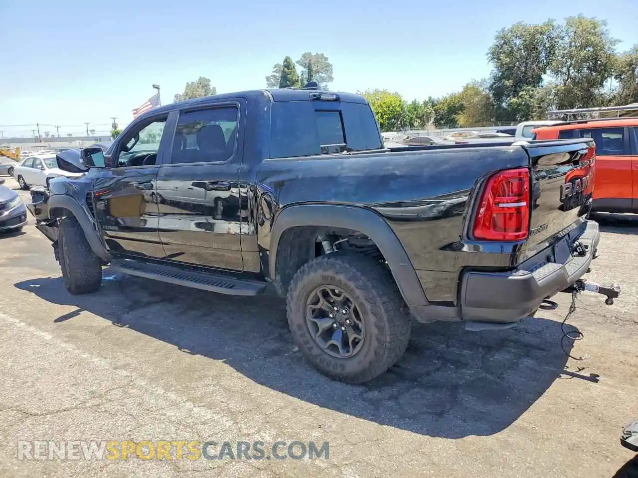 2 Photograph of a damaged car 1C6SRFUP0SN634009 RAM 1500 2025