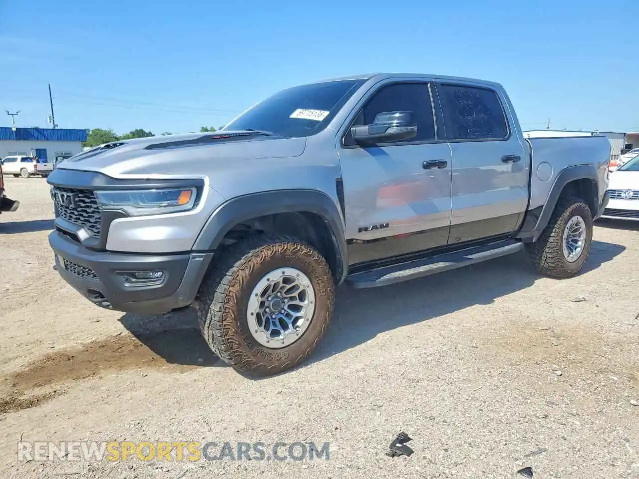 1 Photograph of a damaged car 1C6SRFUP5SN573434 RAM 1500 2025