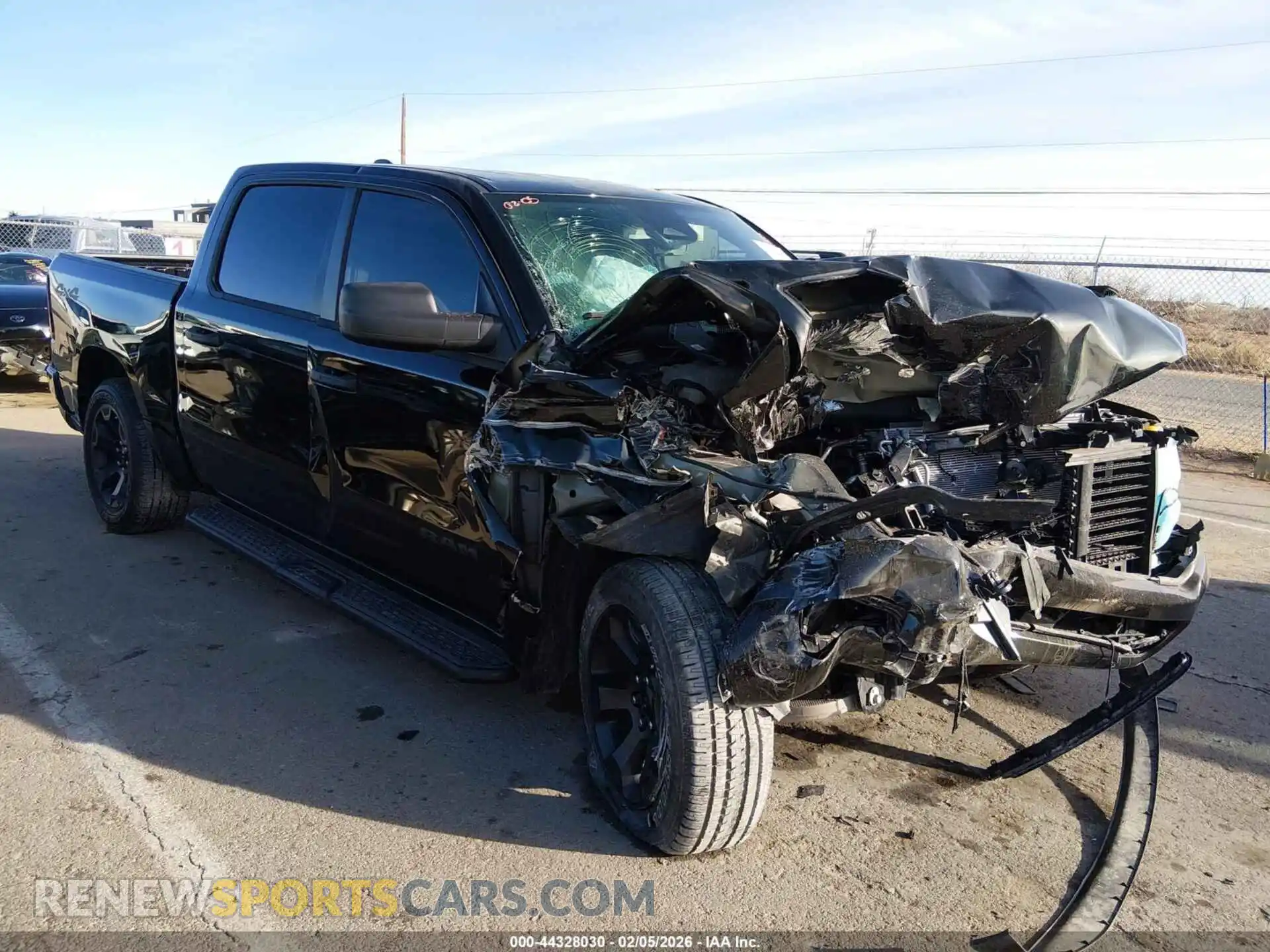1 Photograph of a damaged car 3C6RRFGG8S4162825 RAM 1500 2025