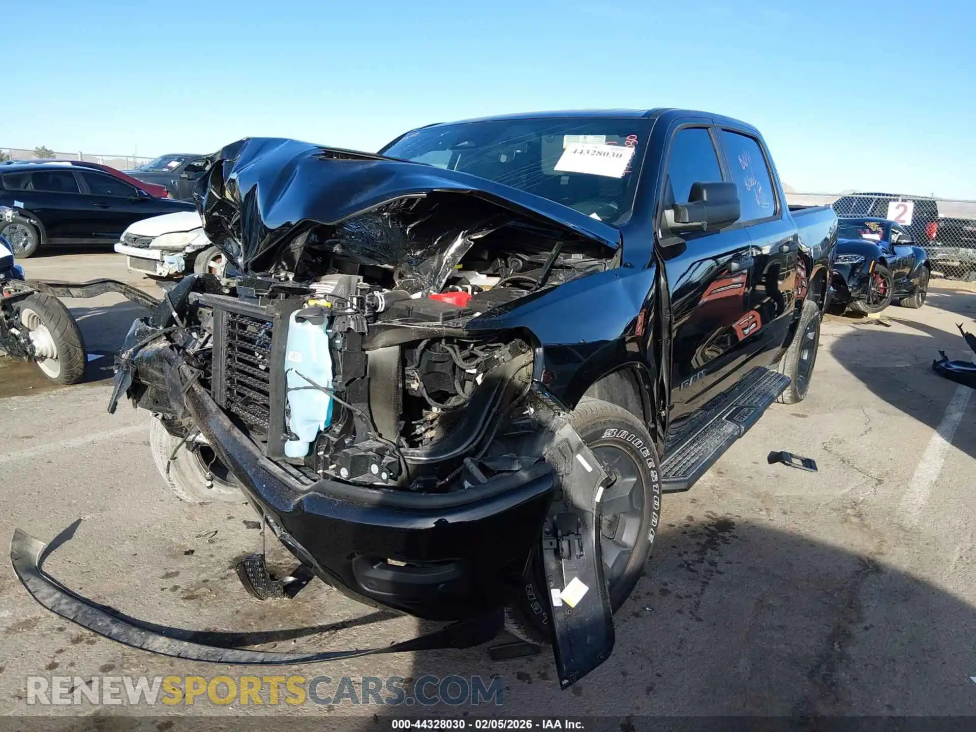 2 Photograph of a damaged car 3C6RRFGG8S4162825 RAM 1500 2025