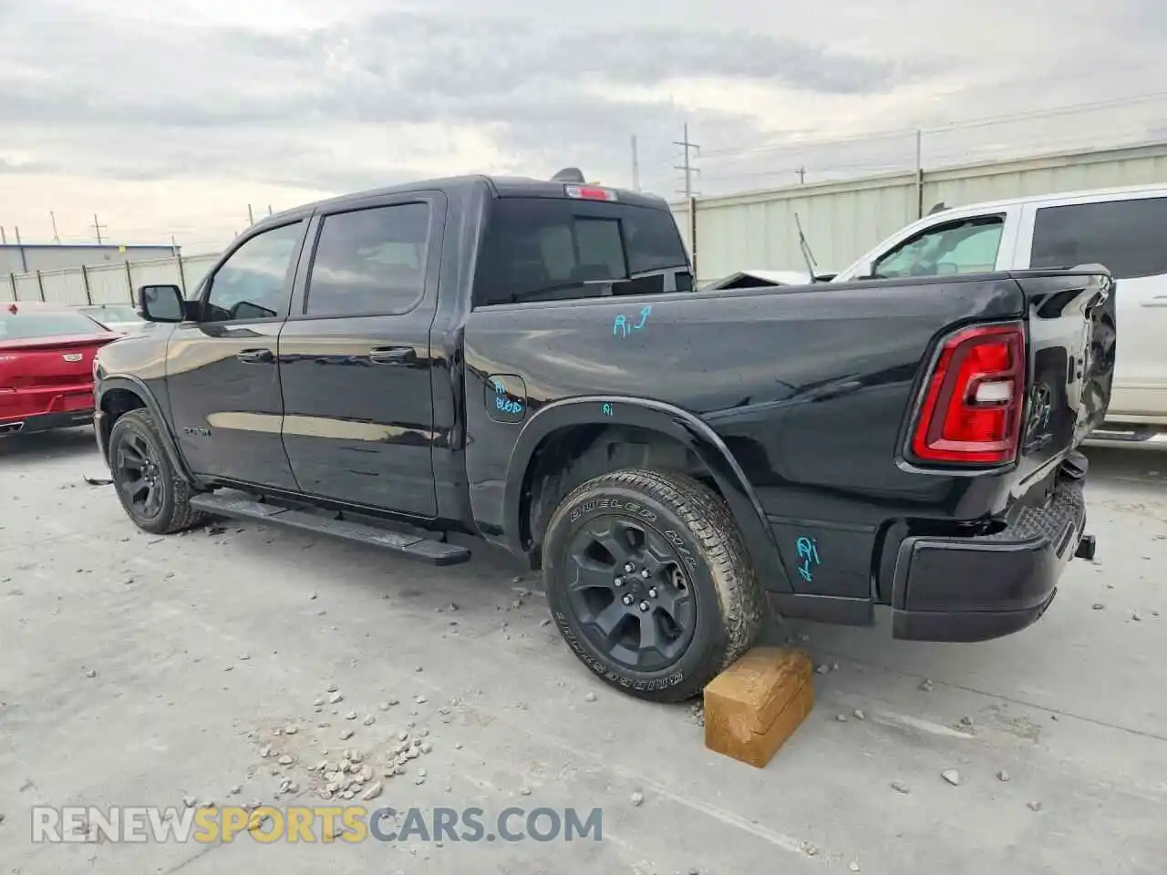 2 Photograph of a damaged car 1C6RREFP0TN151482 RAM 1500 2026