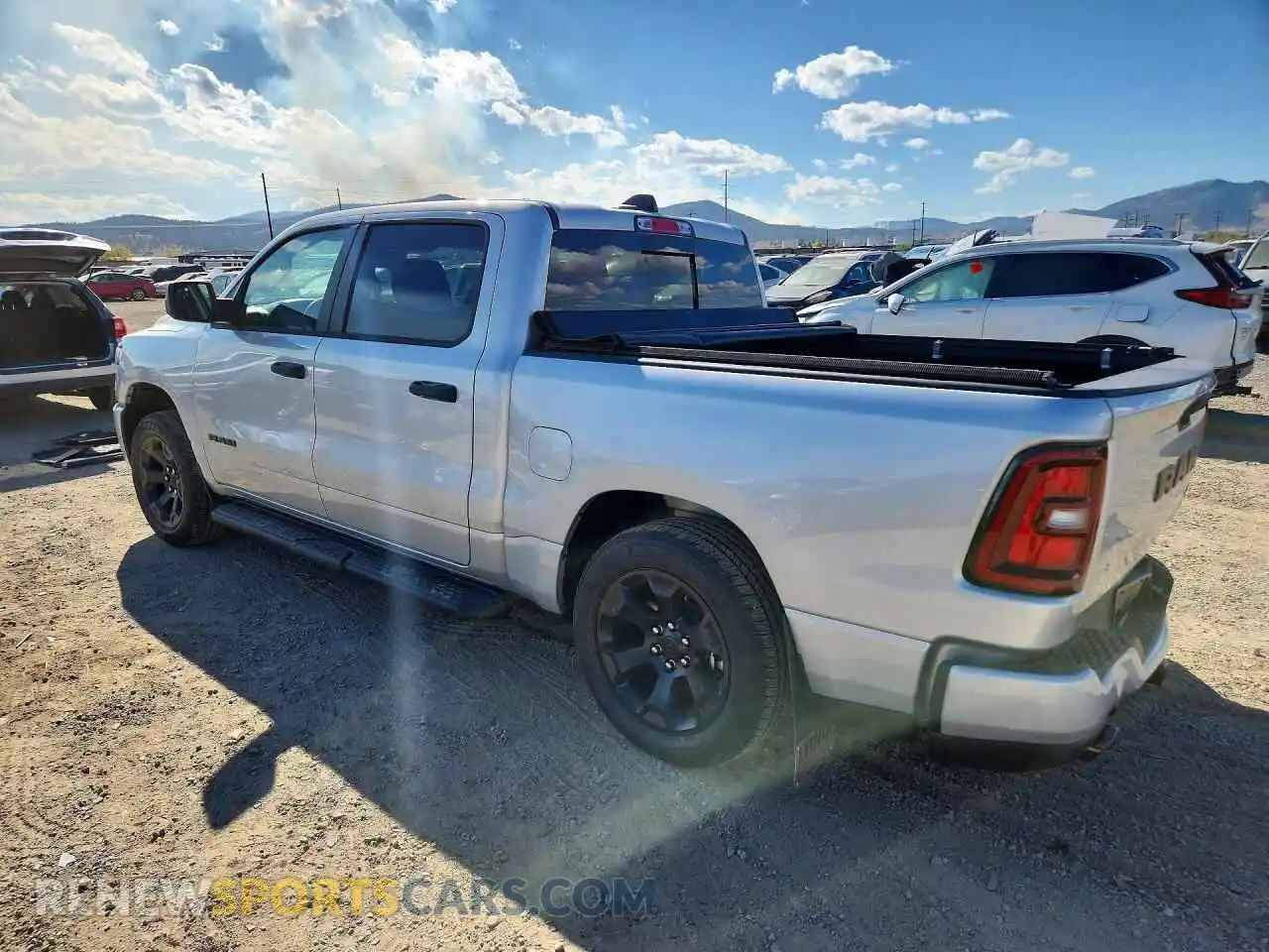 2 Photograph of a damaged car 1C6SRFGP1TN442000 RAM 1500 2026