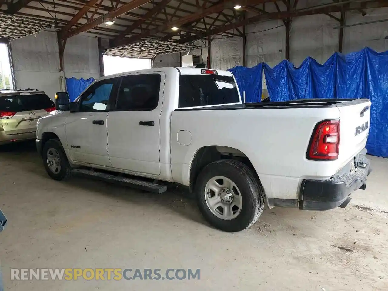 2 Photograph of a damaged car 1C6SRFGP5TN186086 RAM 1500 2026