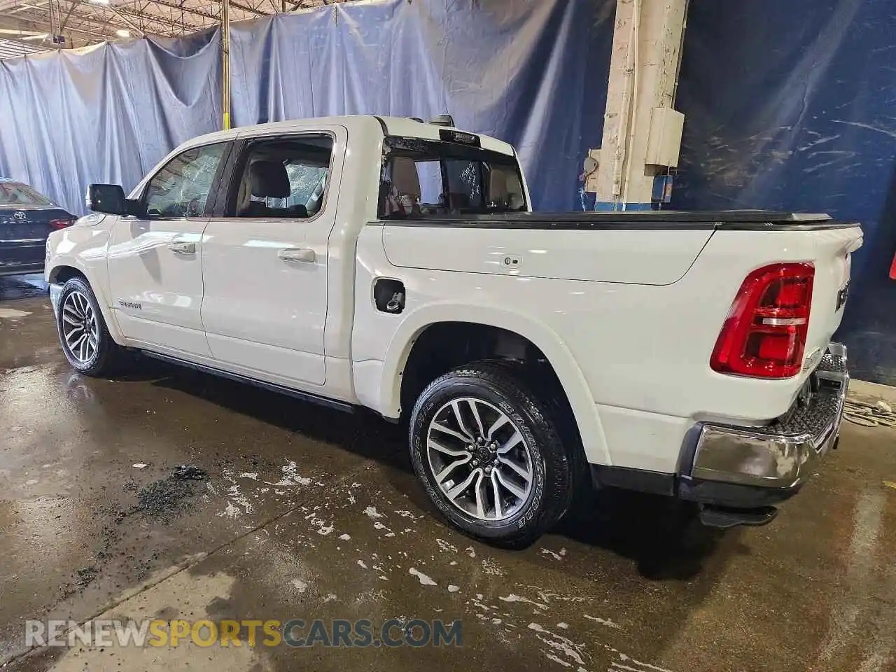 2 fotografías del automóvil dañado 1C6SRFHP6TN395741 RAM 1500 2026
