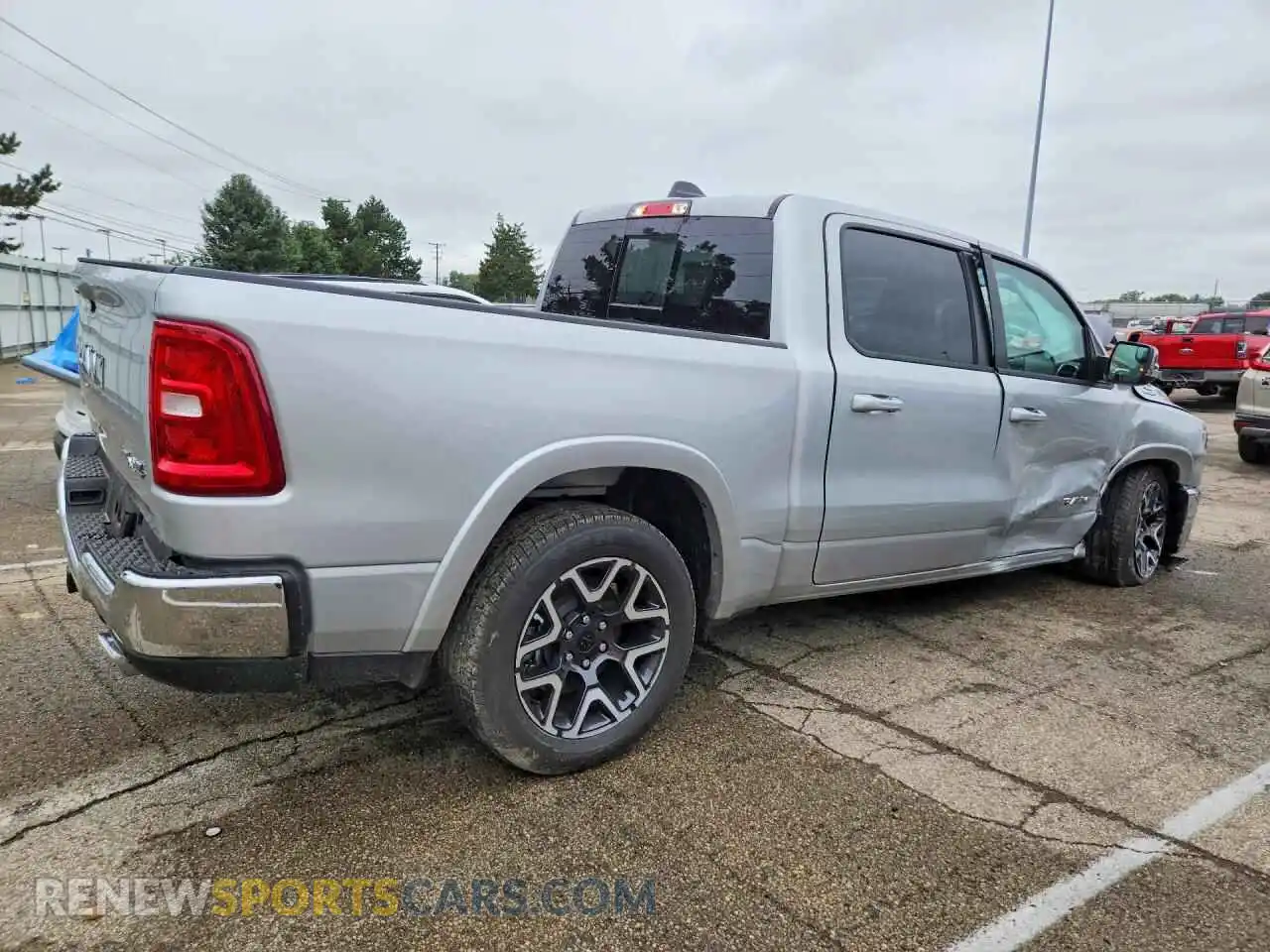 3 fotografías del automóvil dañado 1C6SRFJP1TN362382 RAM 1500 2026