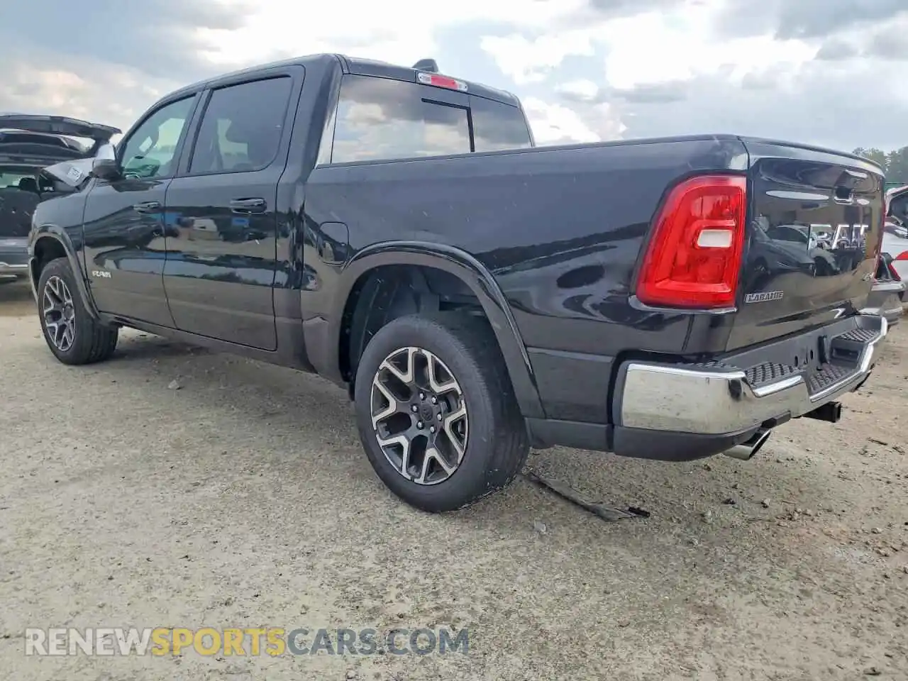 2 Photograph of a damaged car 1C6SRFJP2TN276014 RAM 1500 2026