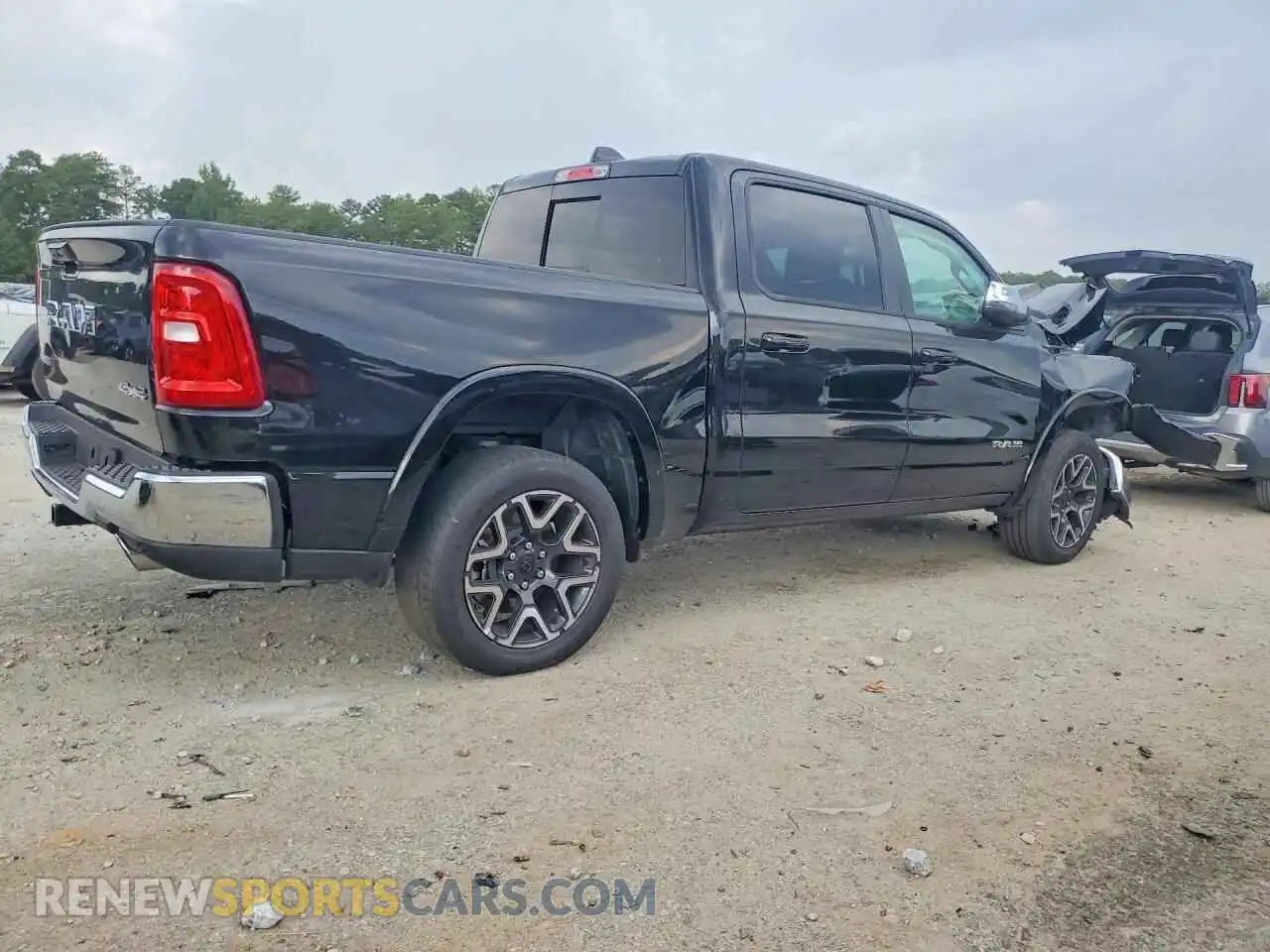 3 Photograph of a damaged car 1C6SRFJP2TN276014 RAM 1500 2026