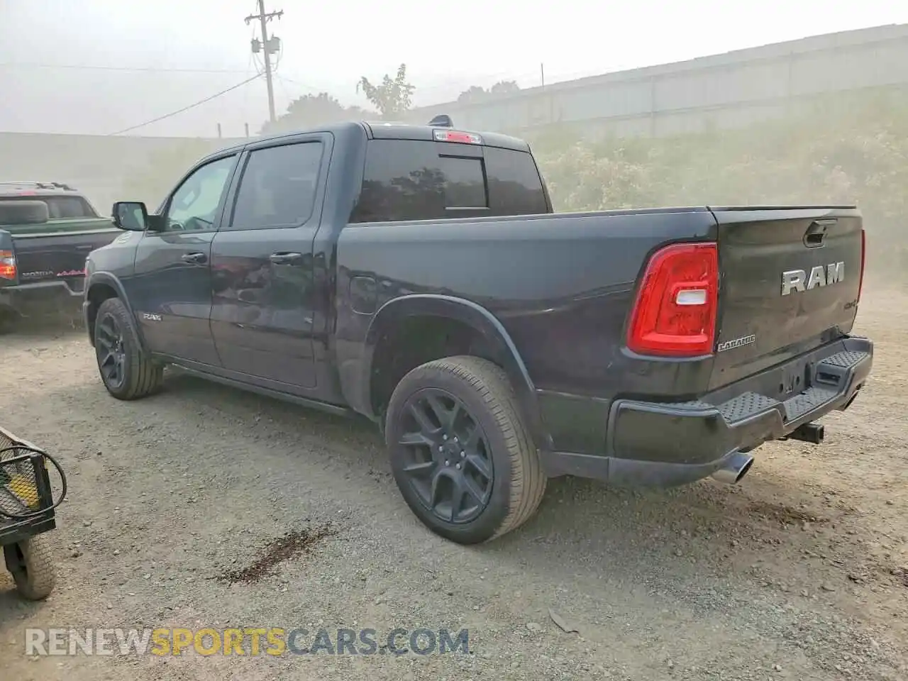 2 Photograph of a damaged car 1C6SRFJP3TN290049 RAM 1500 2026